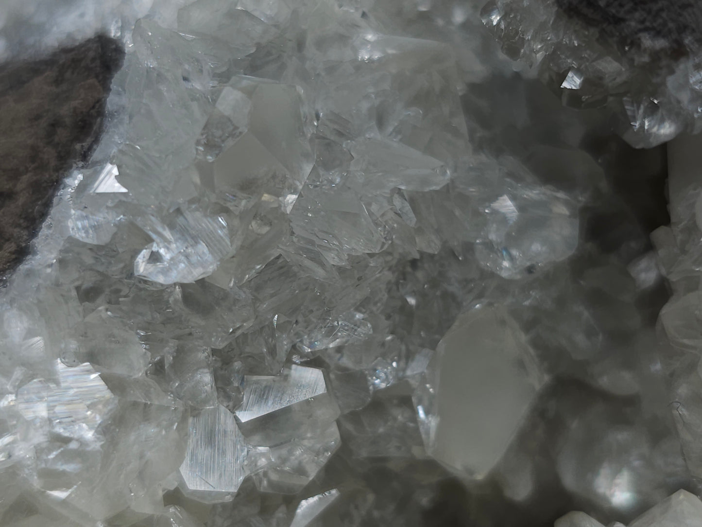 #33161 Super clear Nailhead Spar Calcite geode with Chalcopyrite ore and multiple small fossils in the matrix