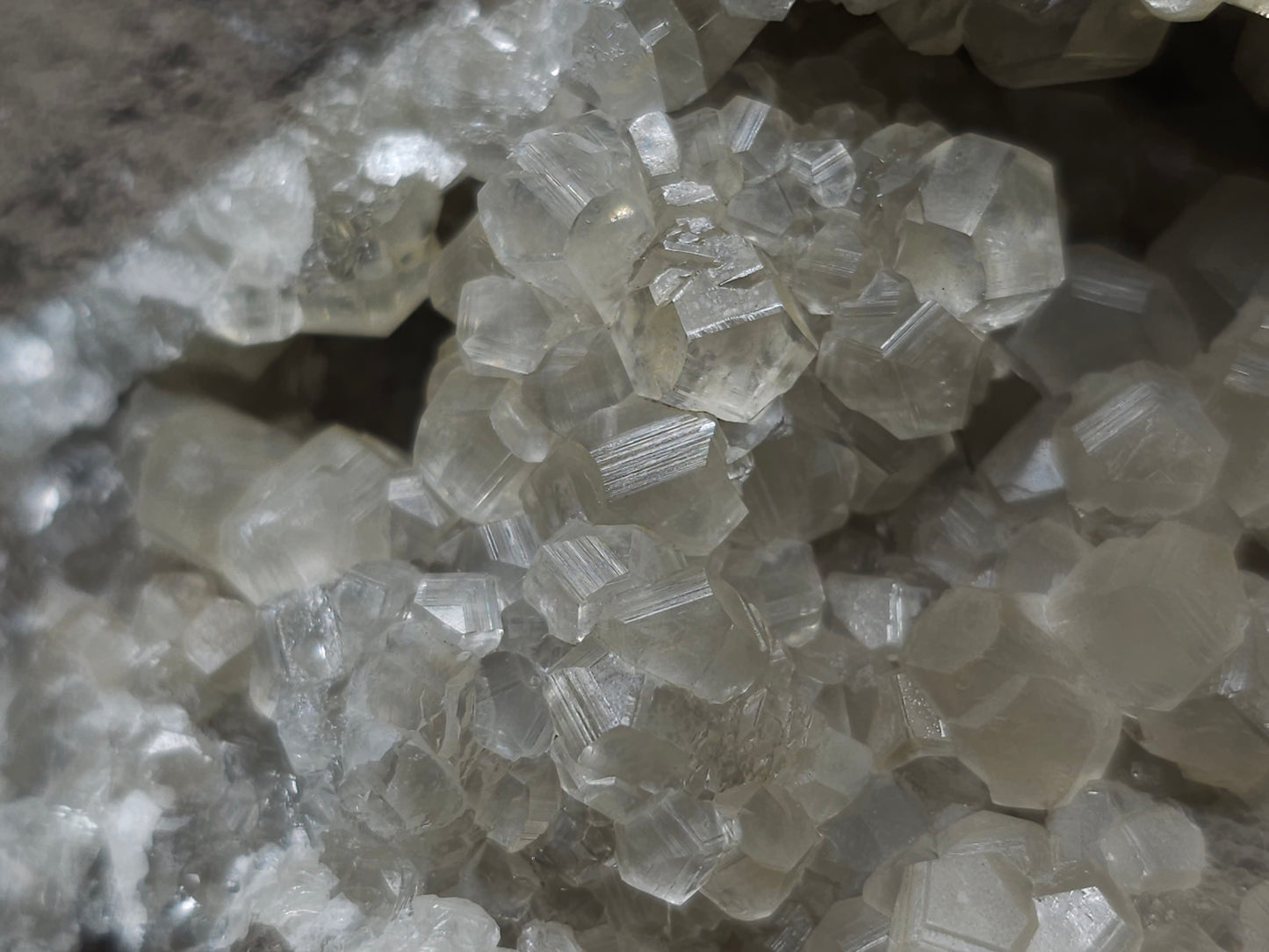#33973 Super clear Nailhead Spar Calcite geode and Chalcopyrite ore and multiple small fossils in the matrix