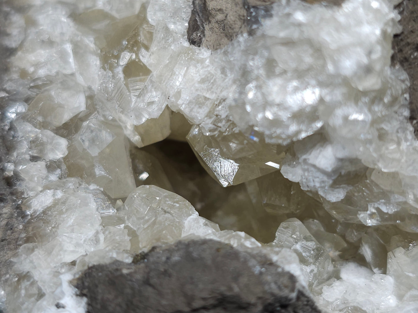 #33973 Super clear Nailhead Spar Calcite geode and Chalcopyrite ore and multiple small fossils in the matrix