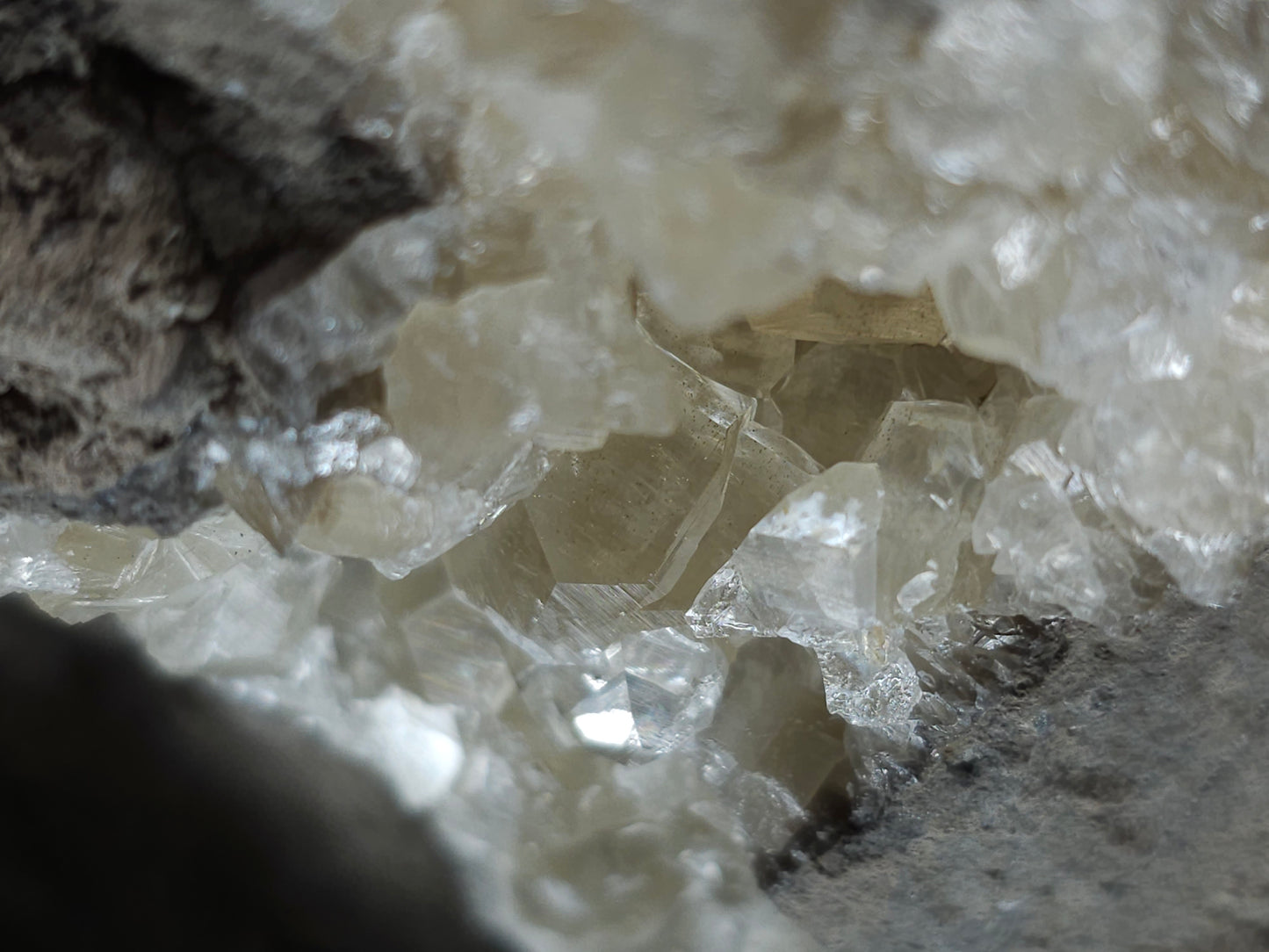 #33973 Super clear Nailhead Spar Calcite geode and Chalcopyrite ore and multiple small fossils in the matrix