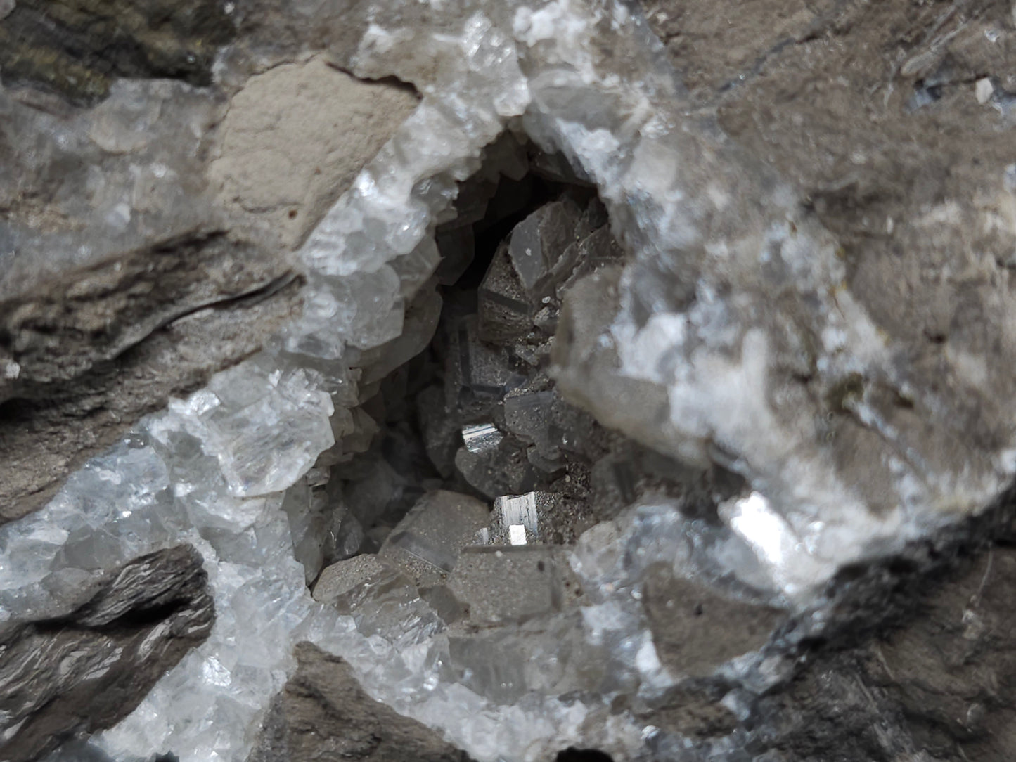 #33973 Super clear Nailhead Spar Calcite geode and Chalcopyrite ore and multiple small fossils in the matrix