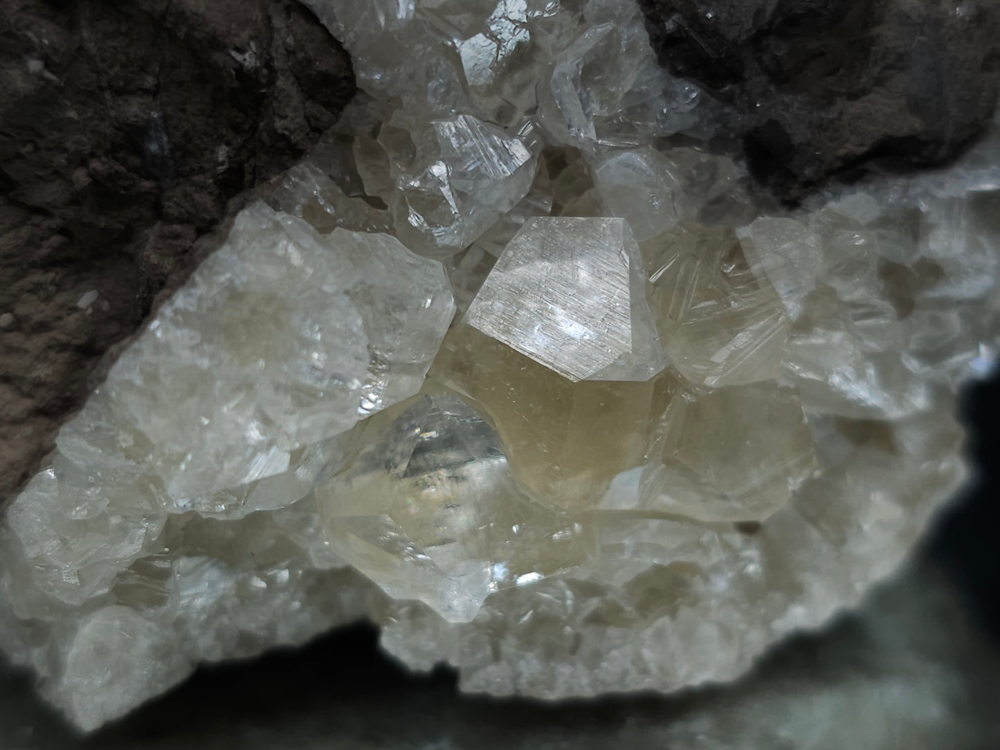 #33976 Super clear Nailhead Spar Calcite geode and Chalcopyrite ore and multiple small fossils in the matrix
