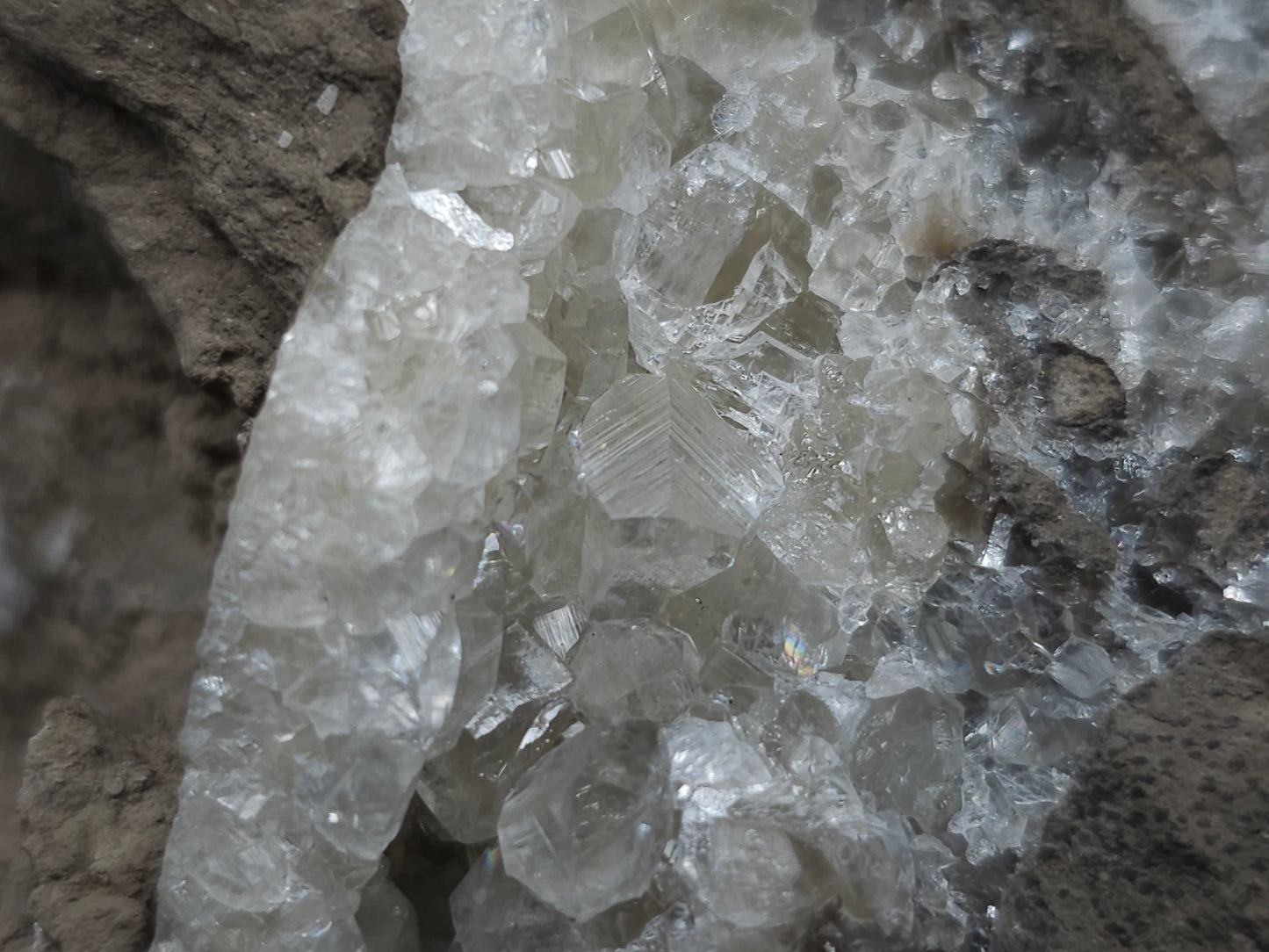 #34011 Super clear Nailhead Spar Calcite geode and Chalcopyrite ore and multiple small fossils in the matrix
