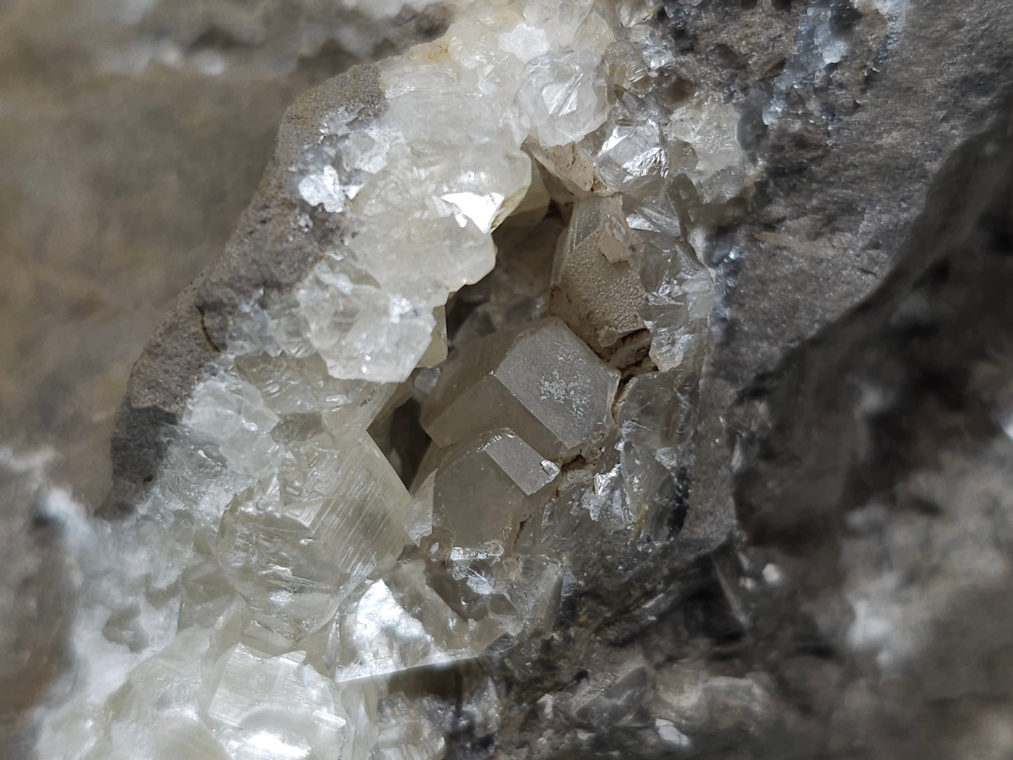 #34020 Super clear Nailhead Spar Calcite geode and Chalcopyrite ore and multiple small fossils in the matrix