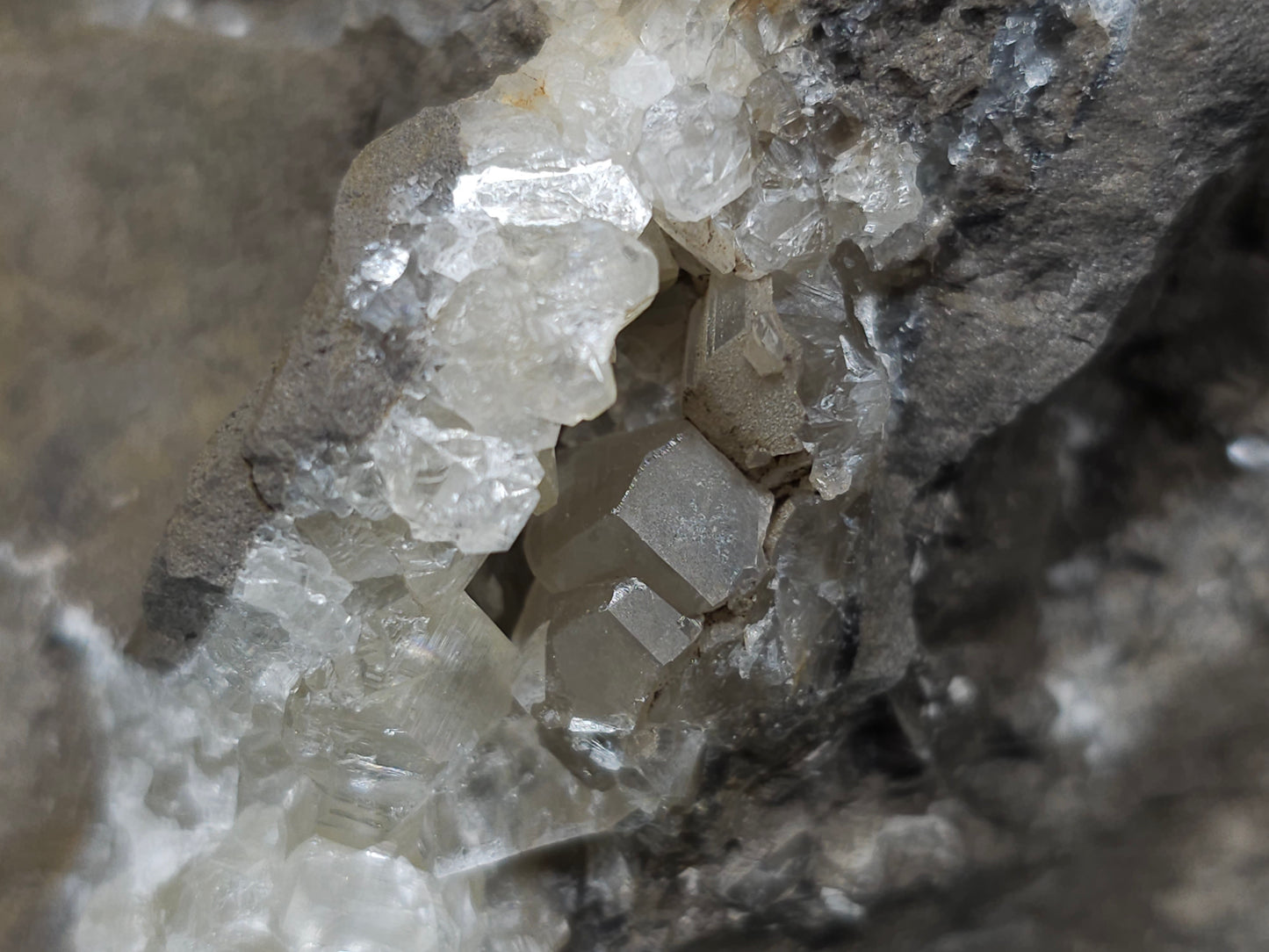 #34020 Super clear Nailhead Spar Calcite geode and Chalcopyrite ore and multiple small fossils in the matrix