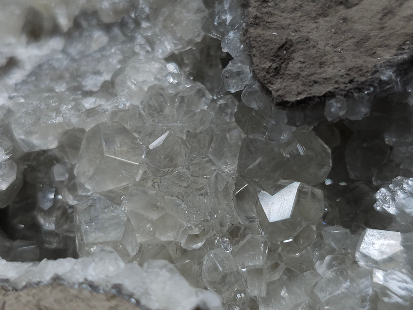 #34020 Super clear Nailhead Spar Calcite geode and Chalcopyrite ore and multiple small fossils in the matrix