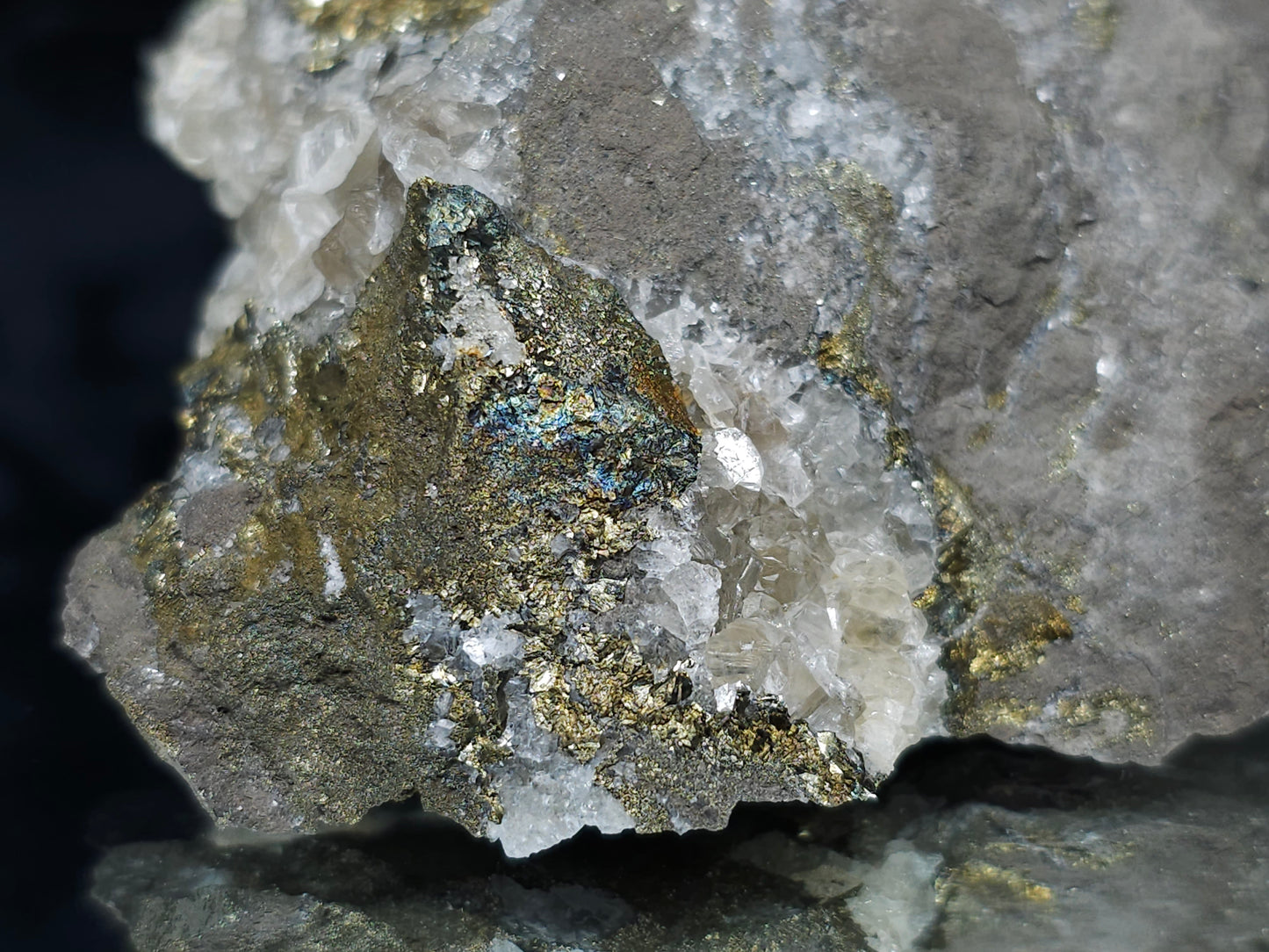 #66007 Peacock Chalcopyrite ore with Calcite and multiple small fossils