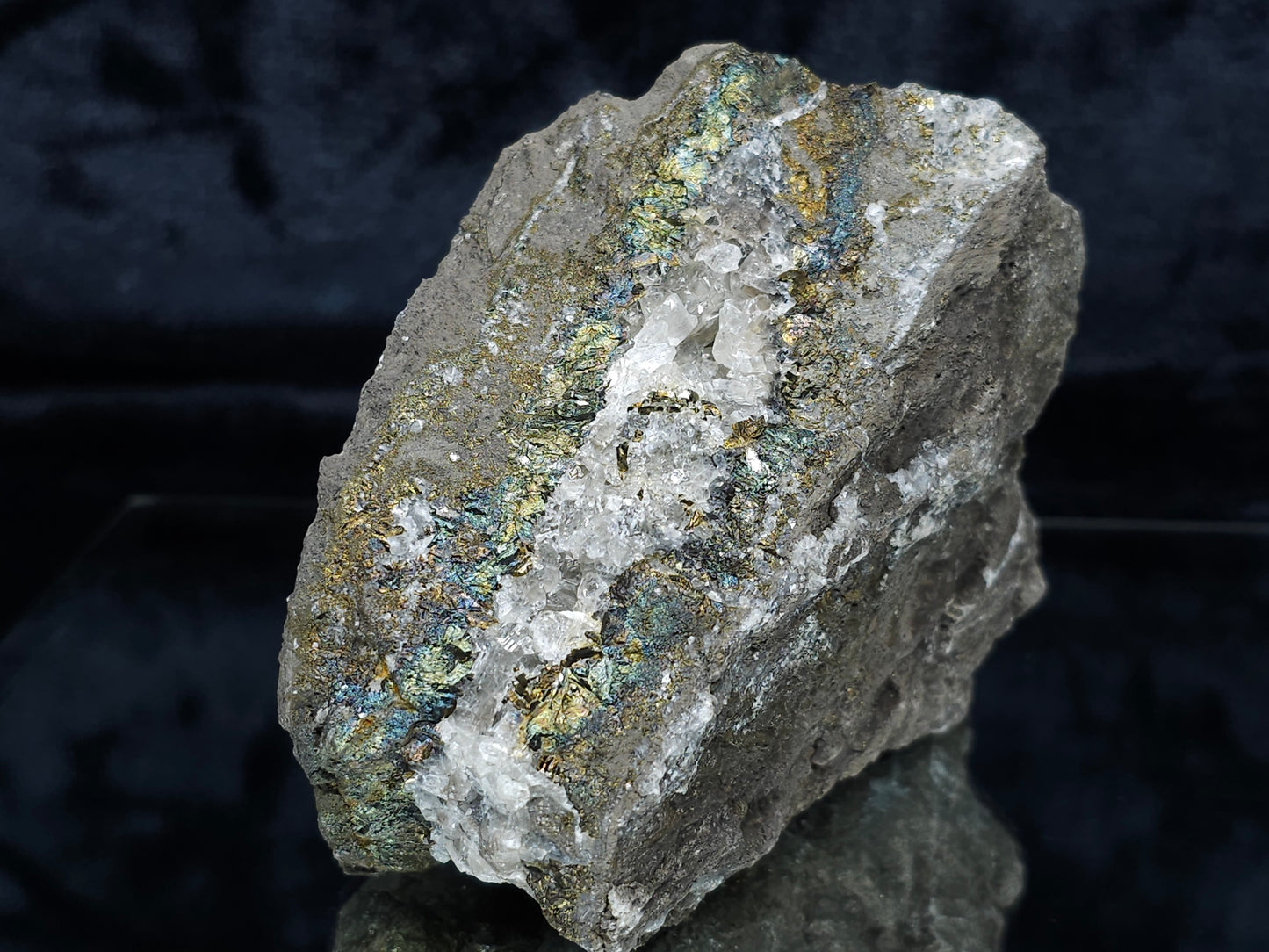 #66013 Peacock Chalcopyrite ore formation it also have an alluring Nailhead Spar Calcite strip with multiple fossil in the matrix