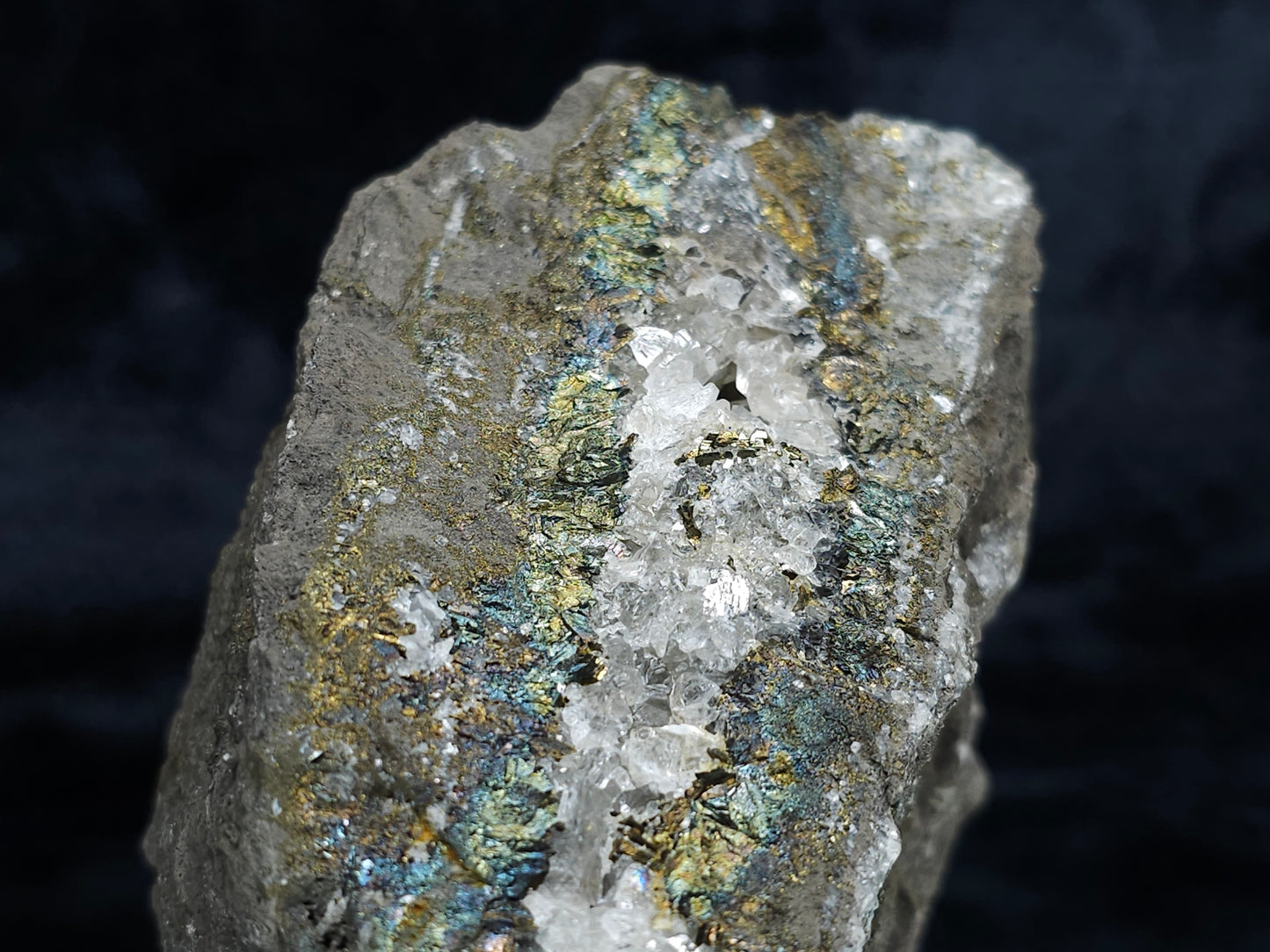 #66013 Peacock Chalcopyrite ore formation it also have an alluring Nailhead Spar Calcite strip with multiple fossil in the matrix