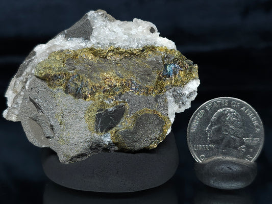 #66024 Hydrothermal mineral deposit that have peacock Chalcopyrite ore also with some wonderful small Nailhead Spar Calcite formation and it have multiple fossils