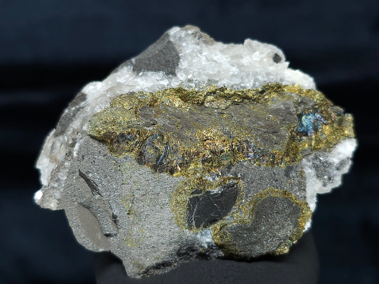 #66024 Hydrothermal mineral deposit that have peacock Chalcopyrite ore also with some wonderful small Nailhead Spar Calcite formation and it have multiple fossils