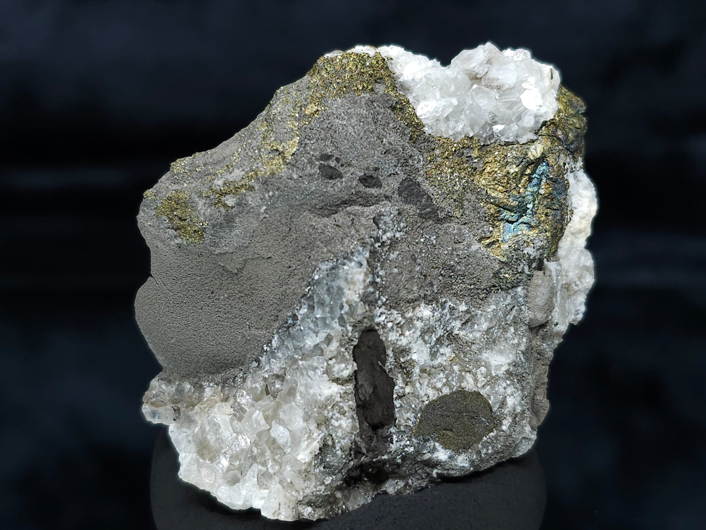 #66024 Hydrothermal mineral deposit that have peacock Chalcopyrite ore also with some wonderful small Nailhead Spar Calcite formation and it have multiple fossils