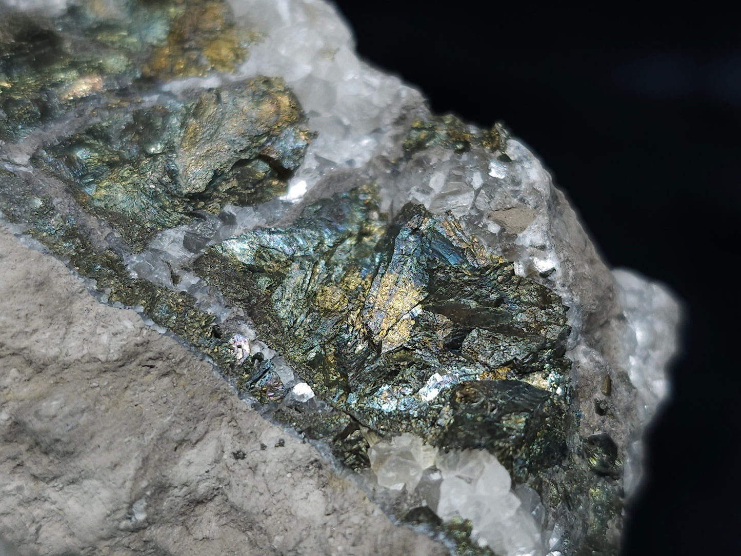 #66027 Hydrothermal mineral deposit that have peacock Chalcopyrite ore with small Dogtooth Spar Calcite geode and multiple fossils