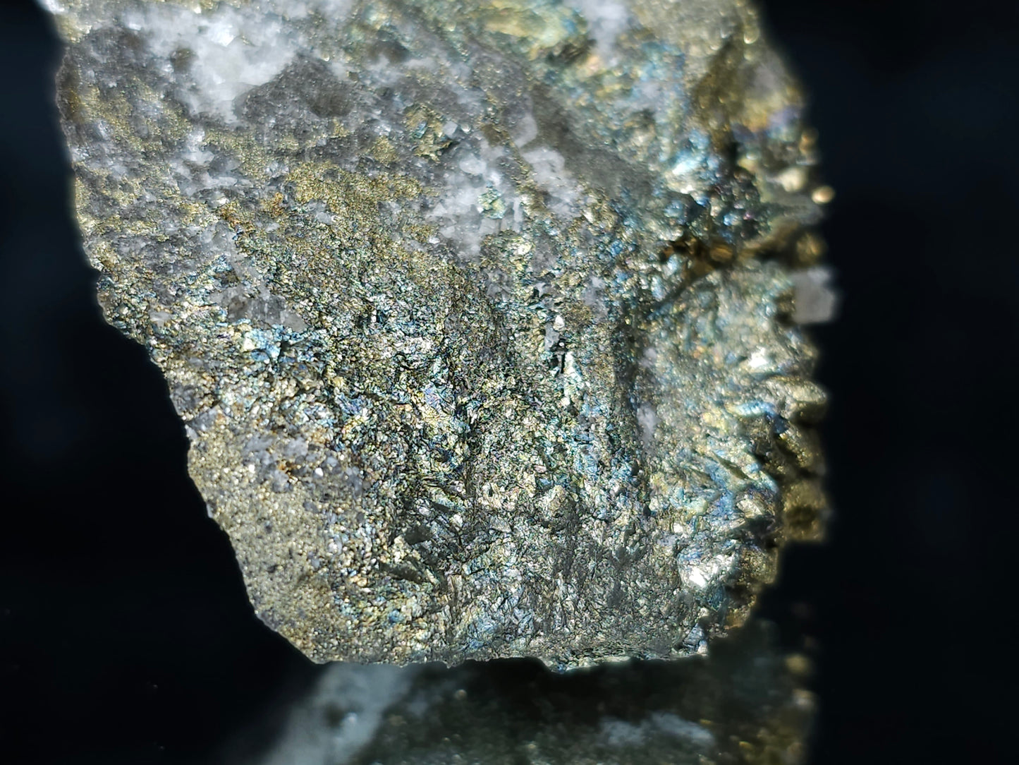 #66038 Iridescent Chalcopyrite with Marcasite formation, it also have beautiful lines of calcite with multiple fossils