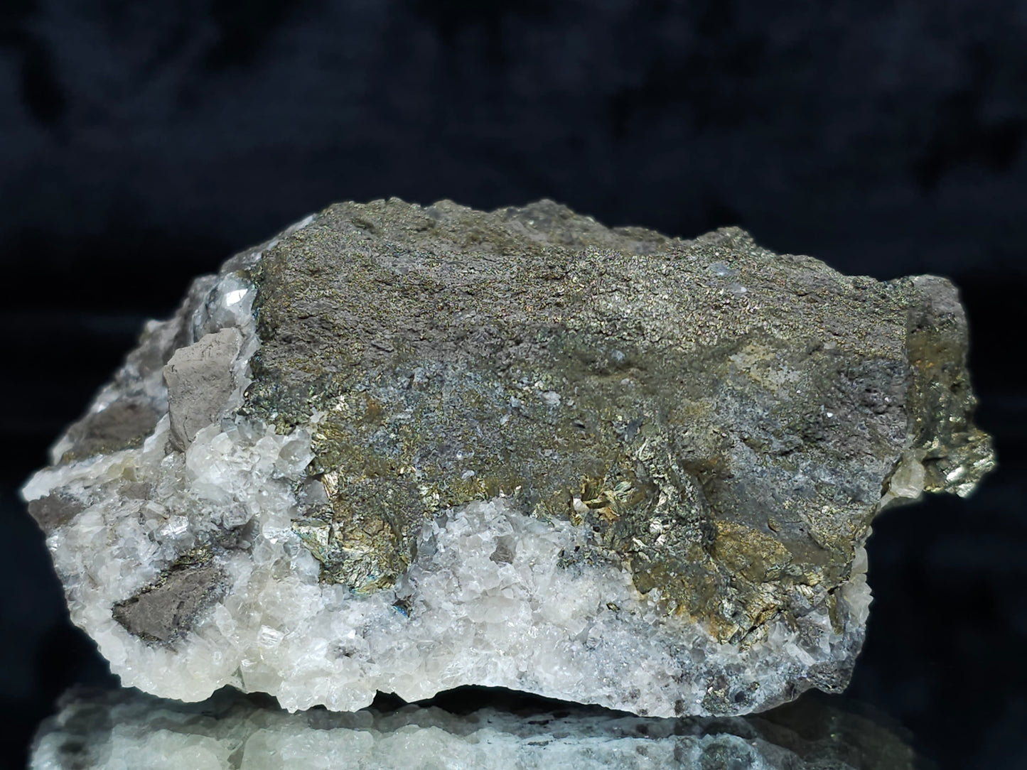 #66059 Iridescent Chalcopyrite ore, golden Chalcopyrite ore with hydrothermal Calcite deposit and multiple small fossils