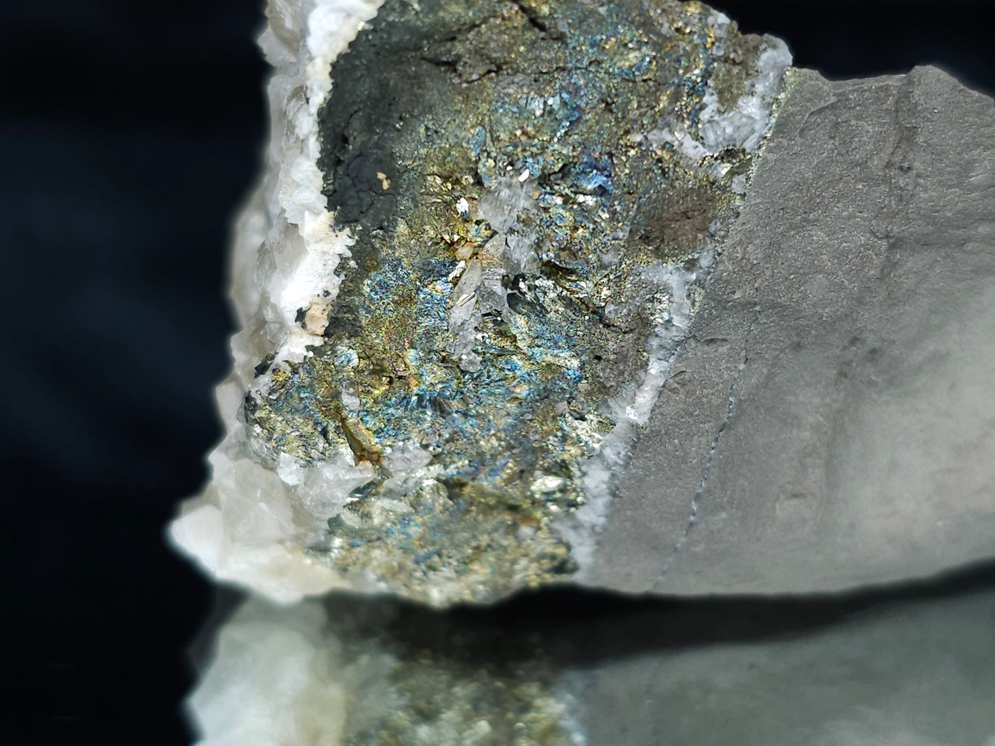 #66120 Iridescent hydrothermal mineral deposit that have peacock Chalcopyrite ore also with some wonderful small Nailhead Spar Calcite cluster with multiple fossils