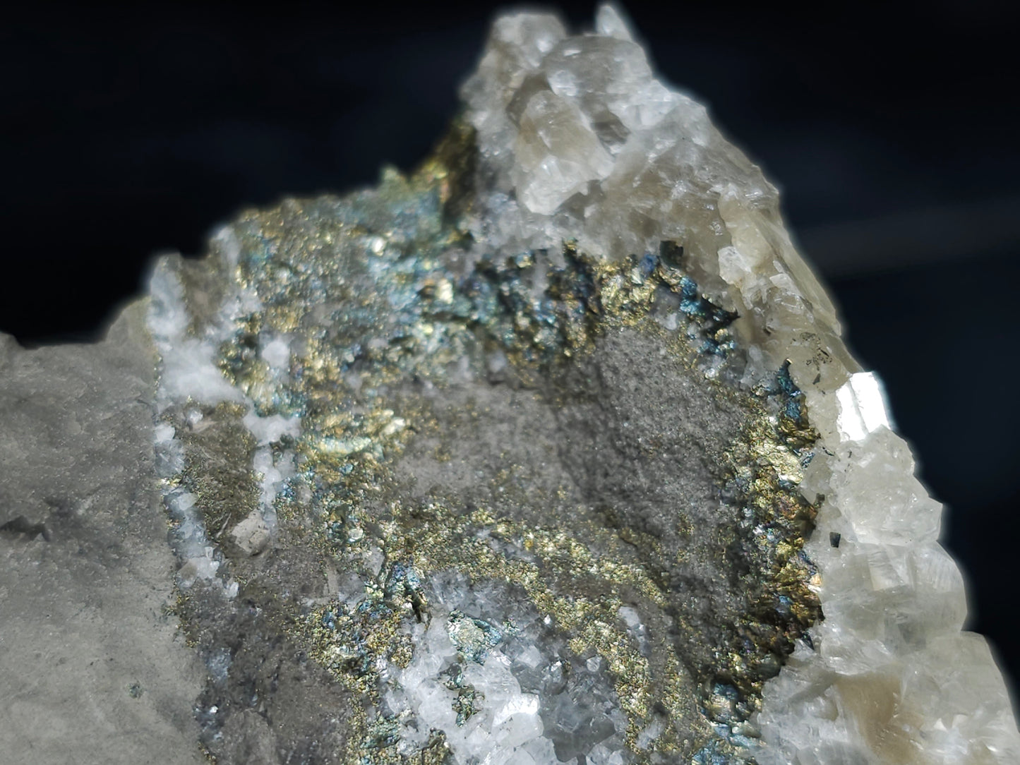 #66120 Iridescent hydrothermal mineral deposit that have peacock Chalcopyrite ore also with some wonderful small Nailhead Spar Calcite cluster with multiple fossils