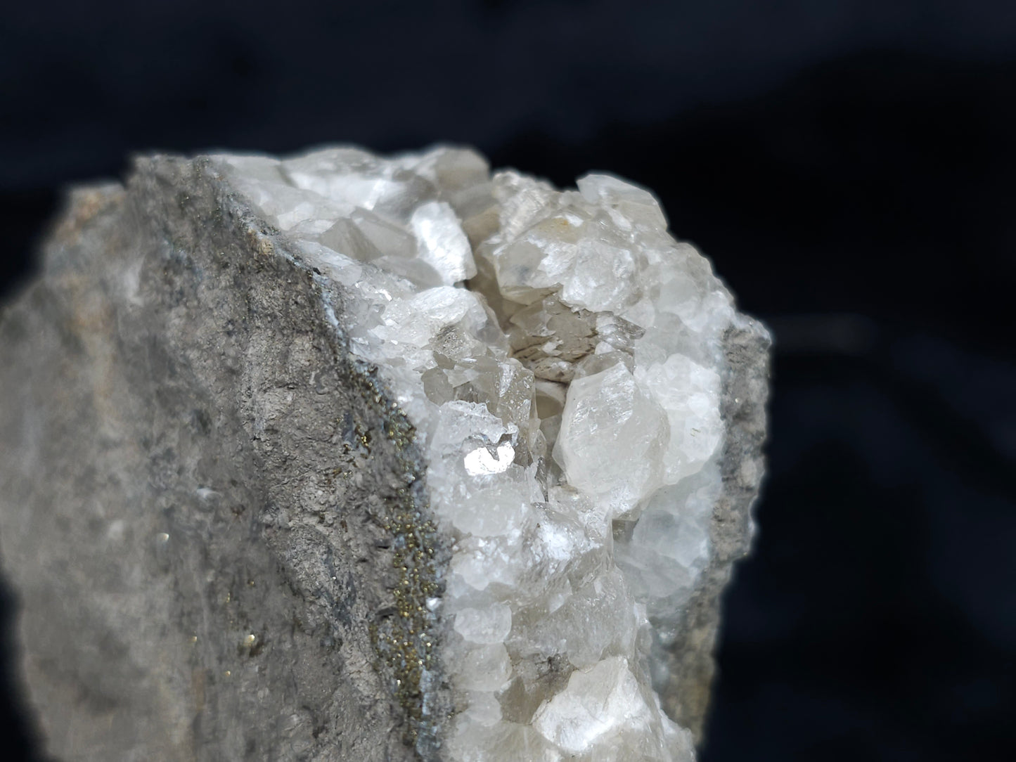 #66131 Iridescent golden Chalcopyrite ore on hydrothermal Nailhead Spar Calcite deposit with multiple small fossils