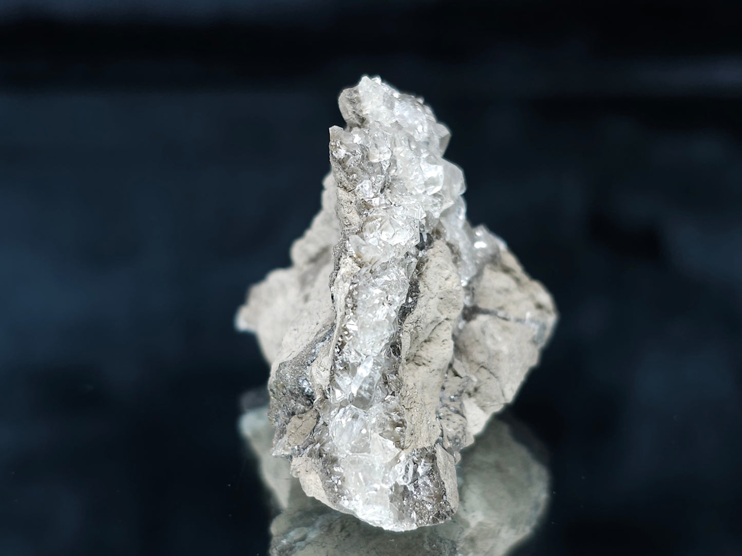 #33649 Super clear Nailhead Spar Calcite tiny cluster and Chalcopyrite ore and multiple small fossils in the matrix