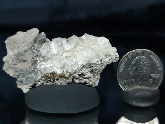 #33652-A Super clear Nailhead Spar Calcite tiny cluster and Chalcopyrite ore and multiple small fossils in the matrix