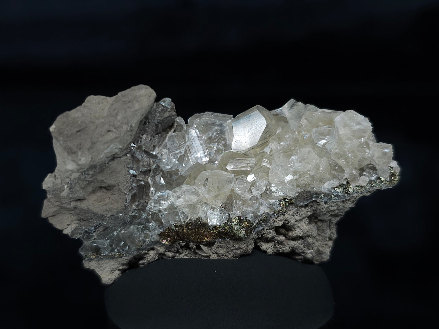#33652-A Super clear Nailhead Spar Calcite tiny cluster and Chalcopyrite ore and multiple small fossils in the matrix