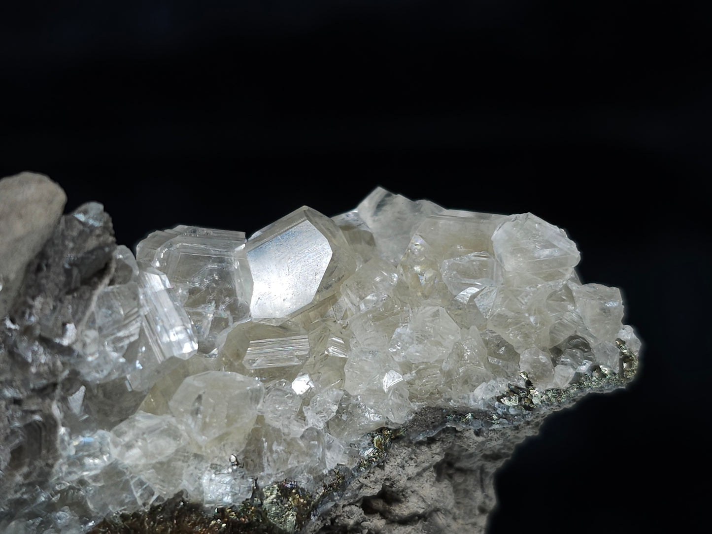 #33652-A Super clear Nailhead Spar Calcite tiny cluster and Chalcopyrite ore and multiple small fossils in the matrix