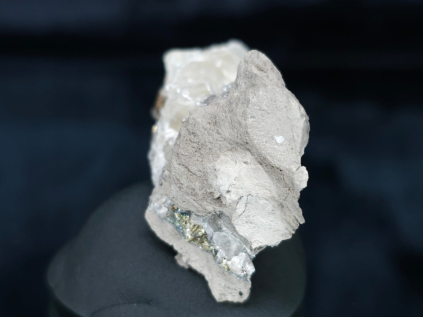 #33652-A Super clear Nailhead Spar Calcite tiny cluster and Chalcopyrite ore and multiple small fossils in the matrix