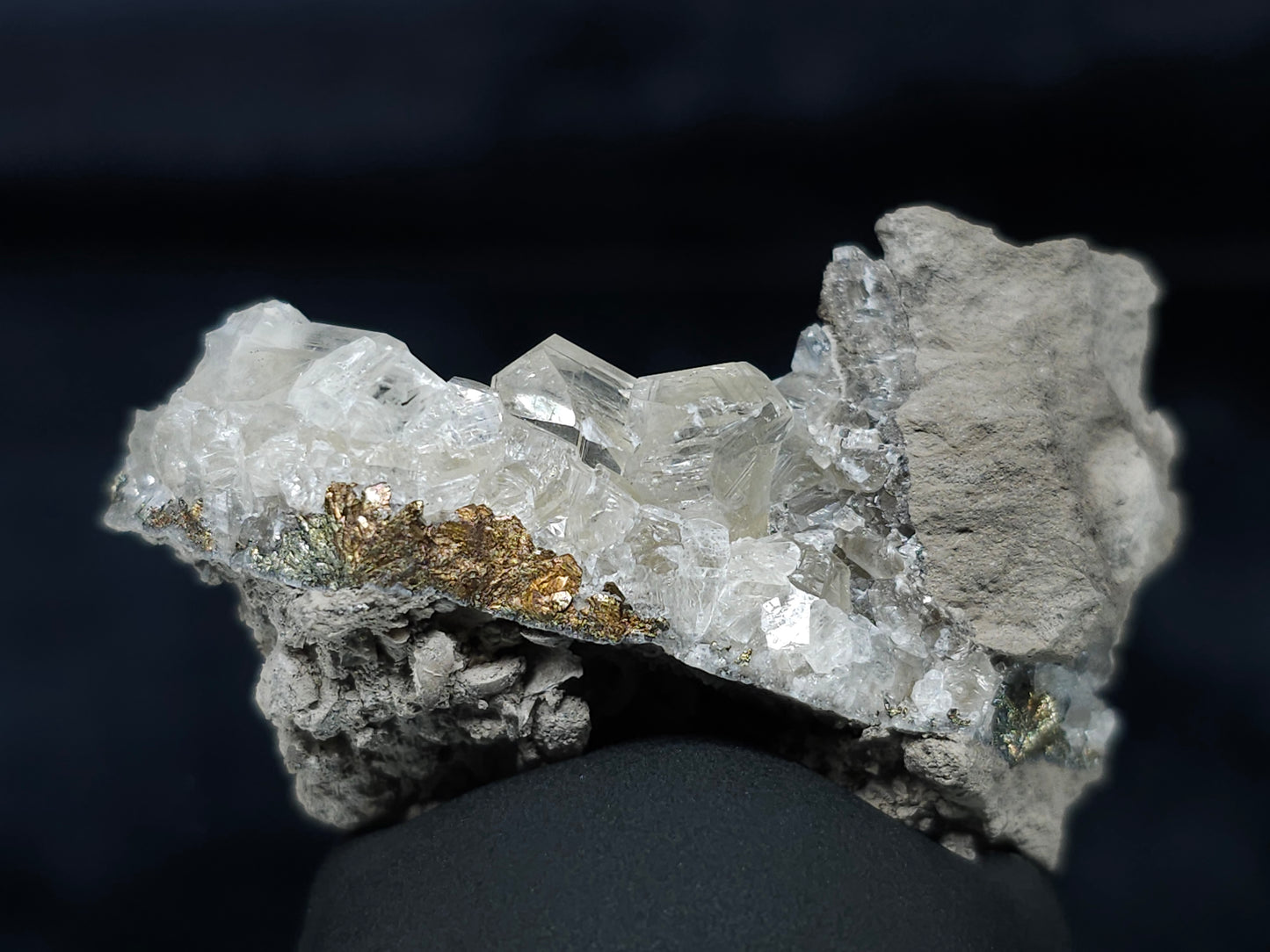 #33652-A Super clear Nailhead Spar Calcite tiny cluster and Chalcopyrite ore and multiple small fossils in the matrix