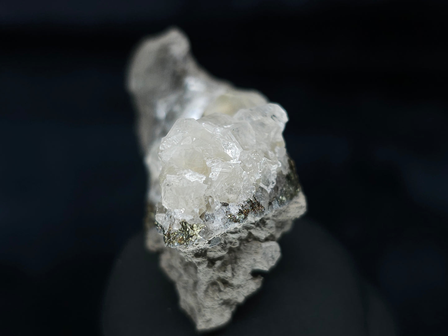 #33652-A Super clear Nailhead Spar Calcite tiny cluster and Chalcopyrite ore and multiple small fossils in the matrix