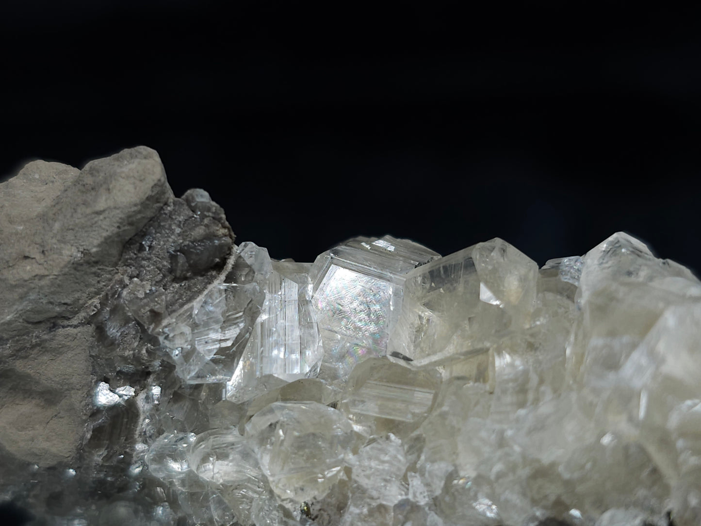 #33652-A Super clear Nailhead Spar Calcite tiny cluster and Chalcopyrite ore and multiple small fossils in the matrix