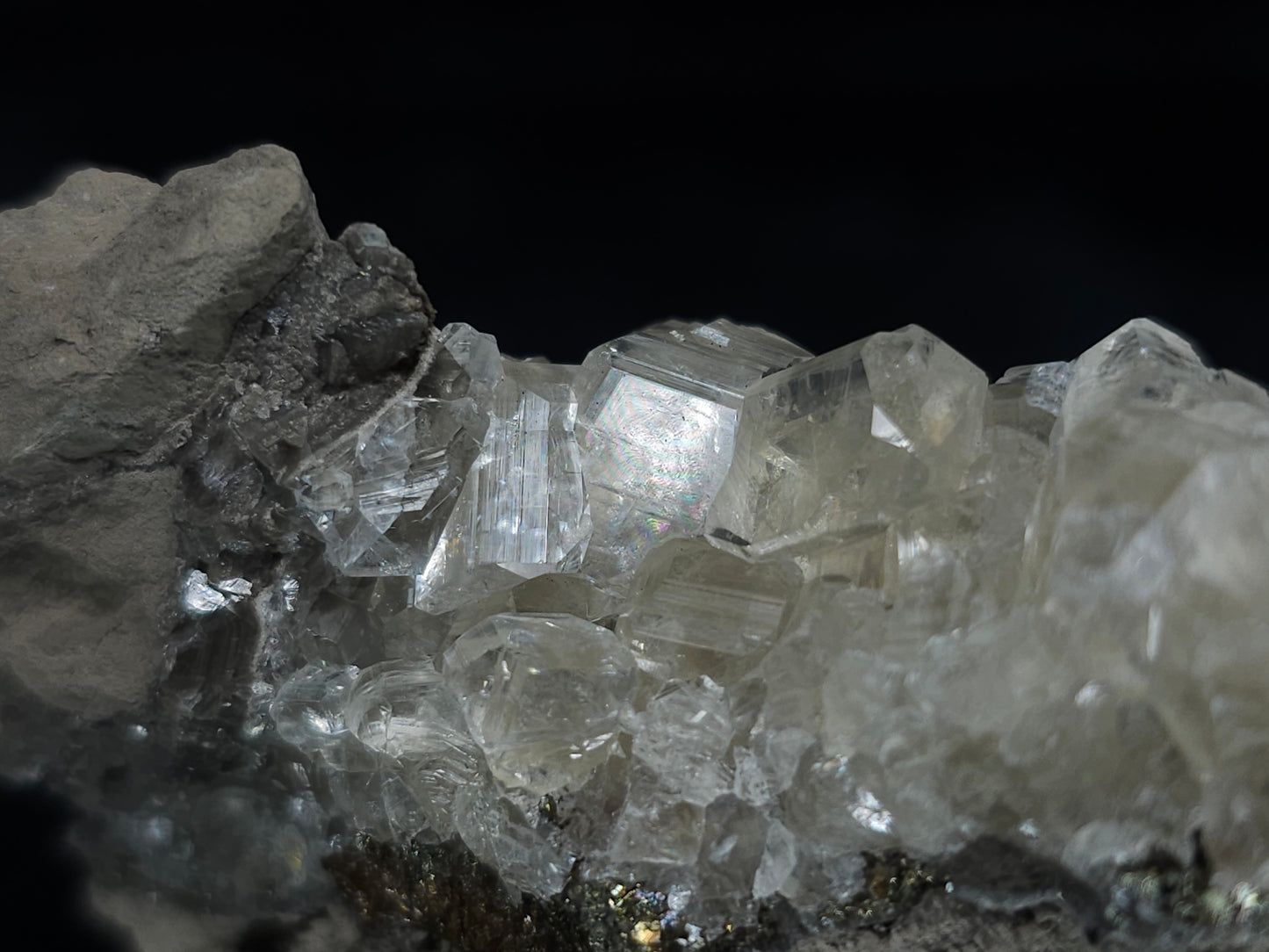 #33652-A Super clear Nailhead Spar Calcite tiny cluster and Chalcopyrite ore and multiple small fossils in the matrix