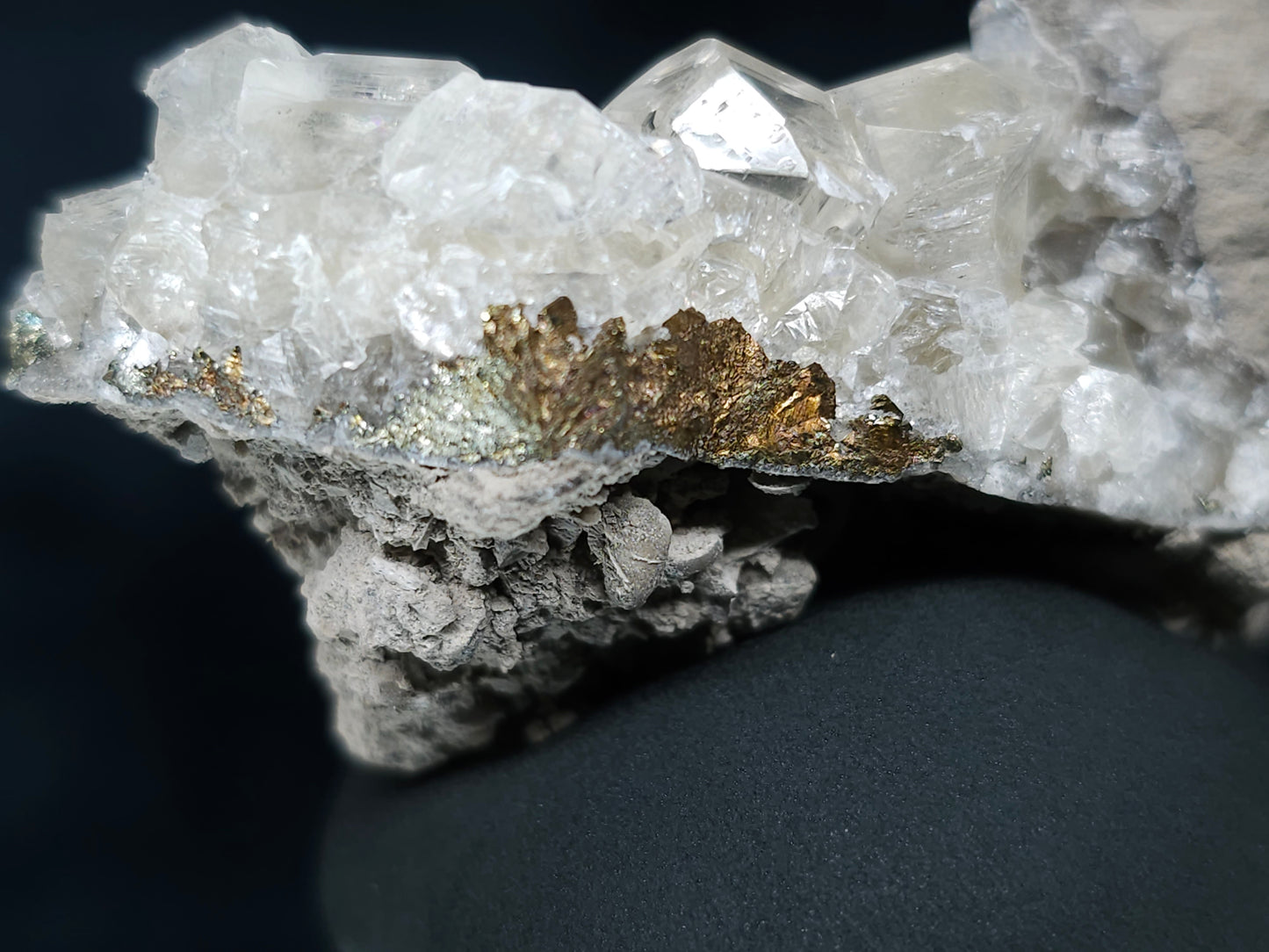 #33652-A Super clear Nailhead Spar Calcite tiny cluster and Chalcopyrite ore and multiple small fossils in the matrix