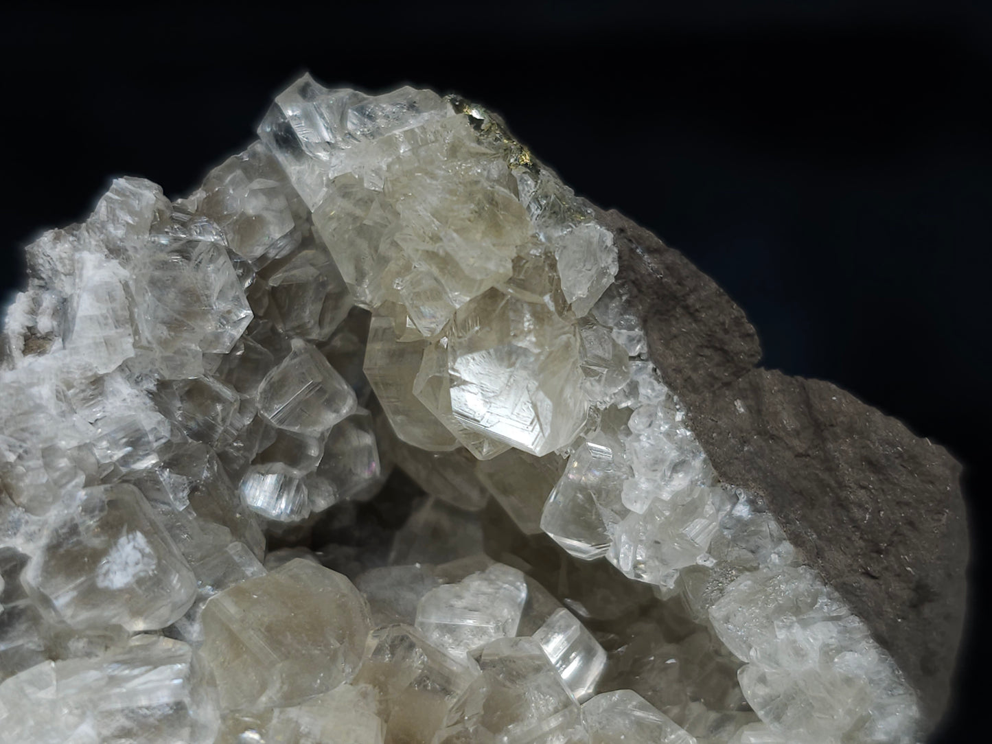 #33662 Super clear Nailhead Spar Calcite geode and Chalcopyrite ore and multiple small fossils in the matrix