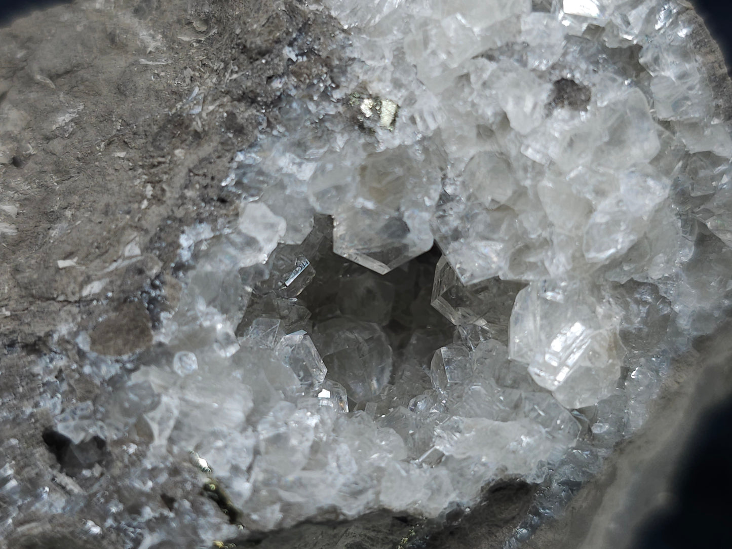 #33697 Super clear Nailhead Spar Calcite geode and Chalcopyrite ore and multiple small fossils in the matrix