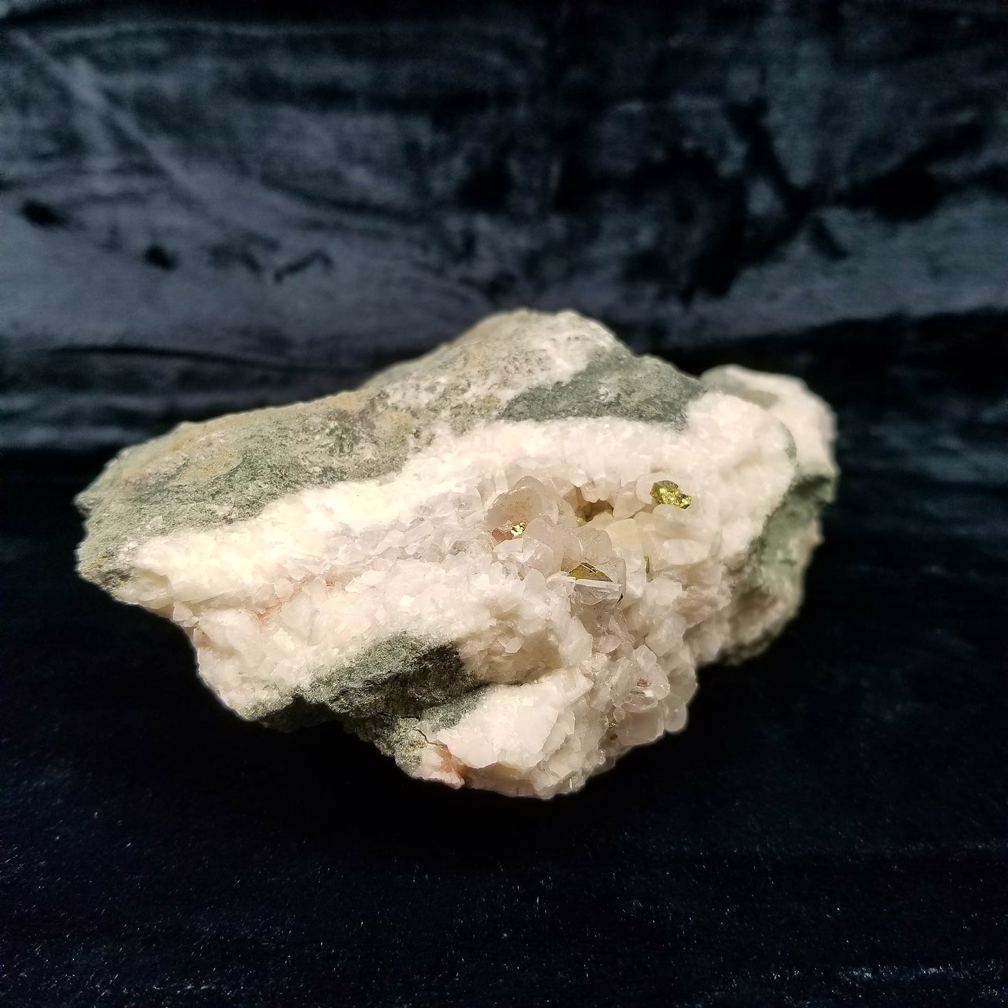 #11083 Iridescent Gold Chalcopyrite on clear Combined form Calcite with Hematite inclusions