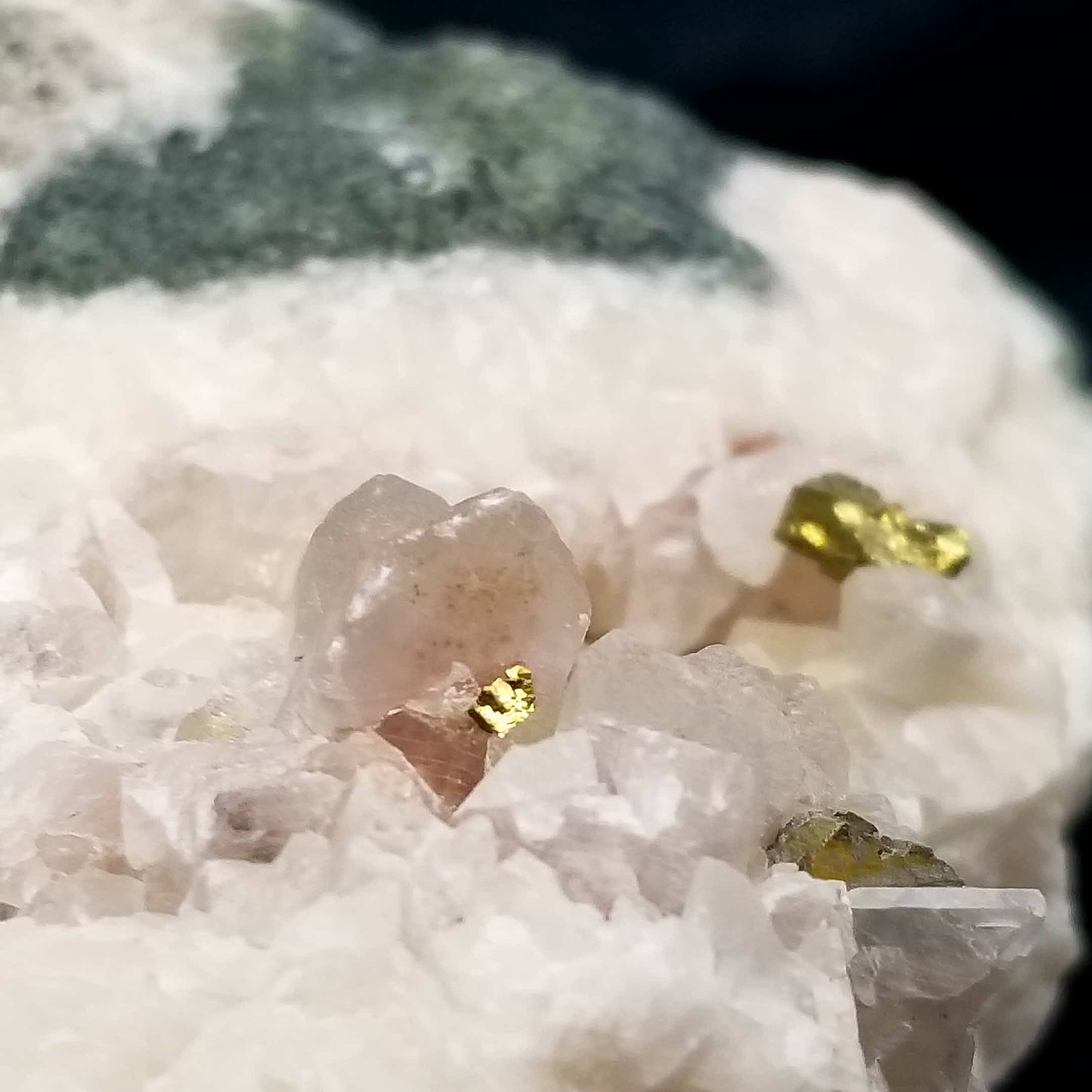 #11083 Iridescent Gold Chalcopyrite on clear Combined form Calcite with Hematite inclusions