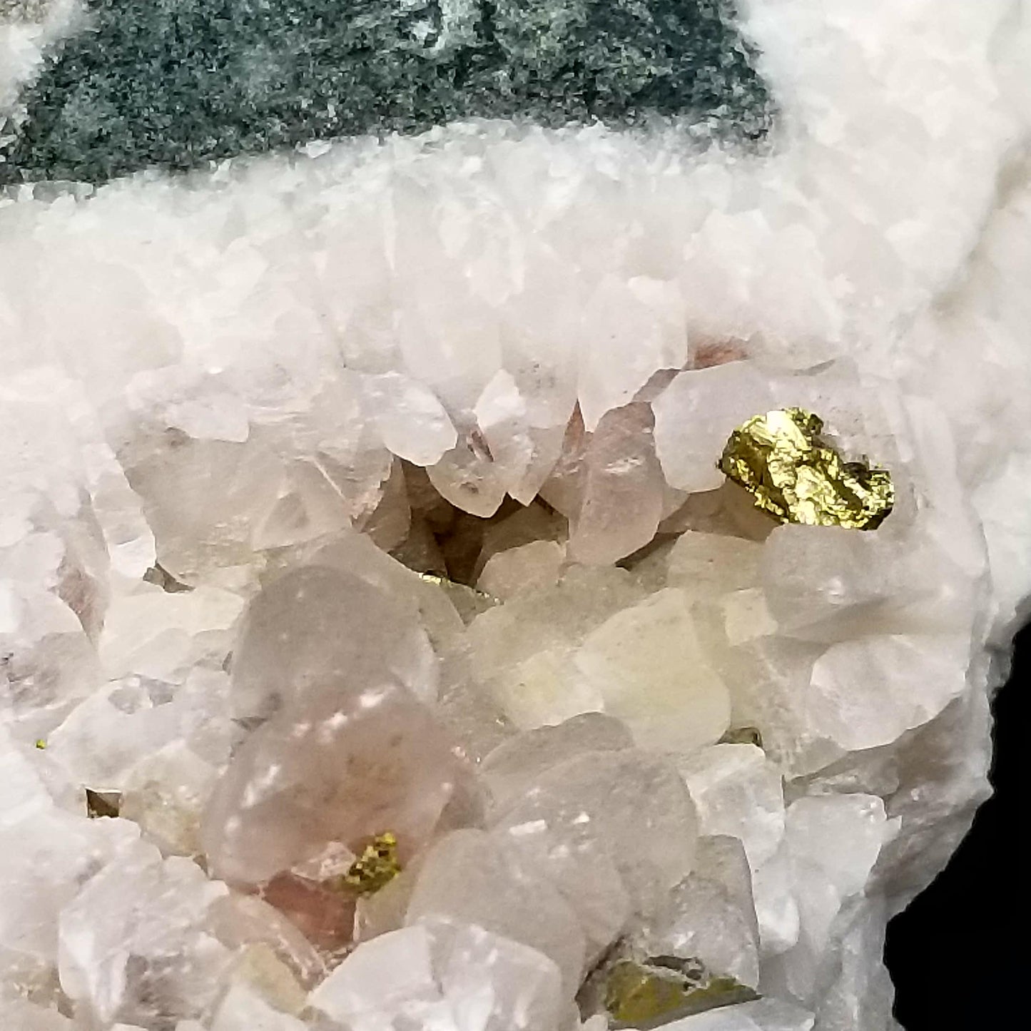 #11083 Iridescent Gold Chalcopyrite on clear Combined form Calcite with Hematite inclusions