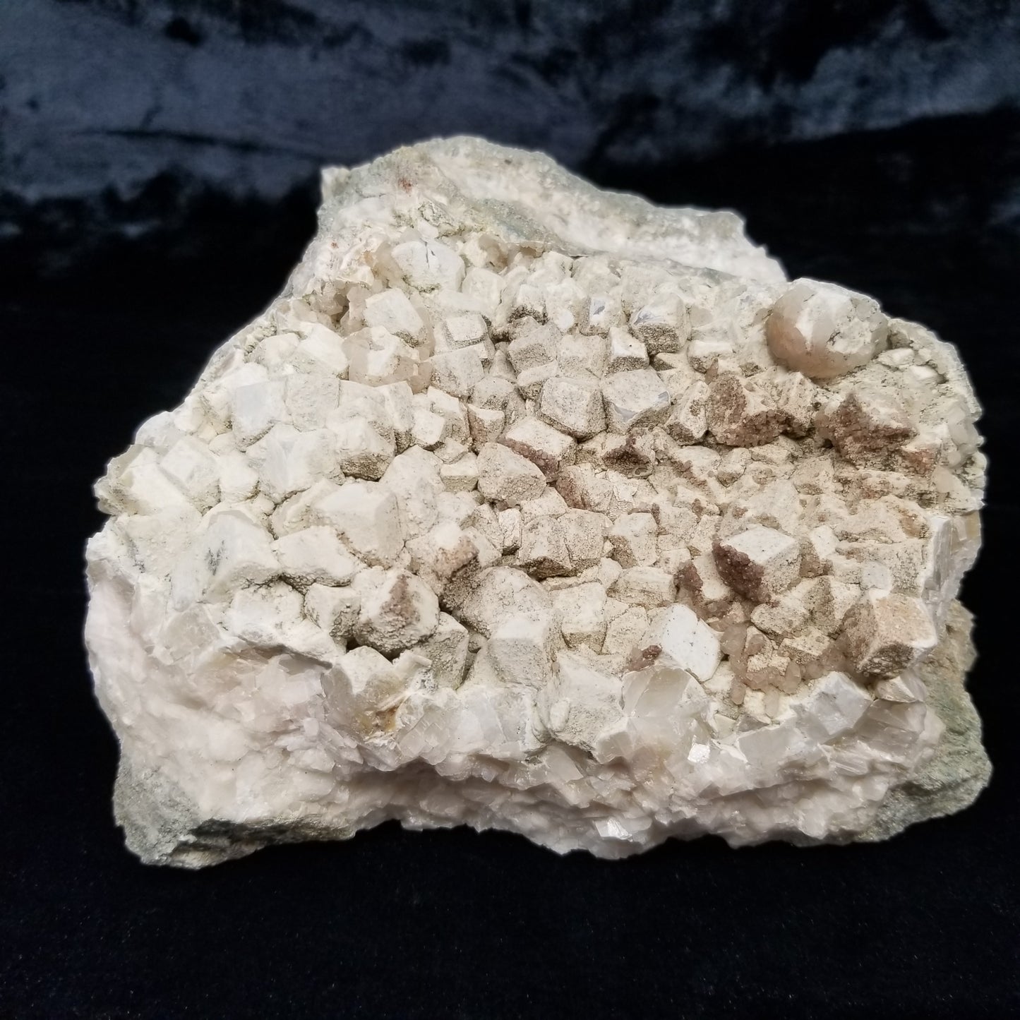 #11114 white Dolomite and small water clear Nailhead Spar Calcite crystals with Hematite inclusions on Combined form Calcite cluster on white Calcite