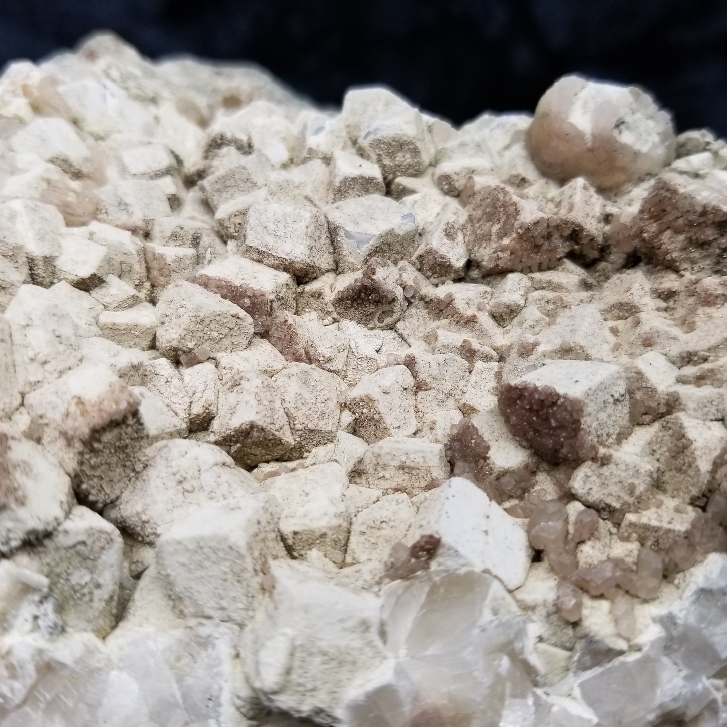 #11114 white Dolomite and small water clear Nailhead Spar Calcite crystals with Hematite inclusions on Combined form Calcite cluster on white Calcite