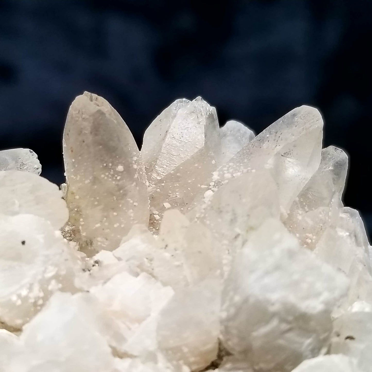 #11134 White Dolomite coating on clear Dogtooth Spar Calcite cluster with Chalcopyrite and Hematite inclusions