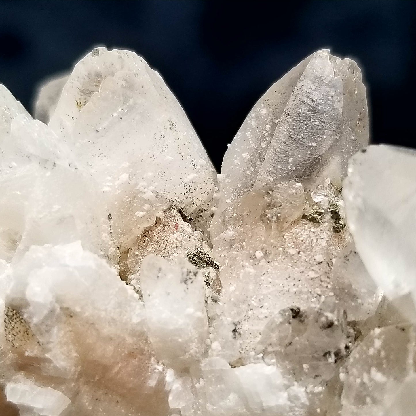 #11134 White Dolomite coating on clear Dogtooth Spar Calcite cluster with Chalcopyrite and Hematite inclusions