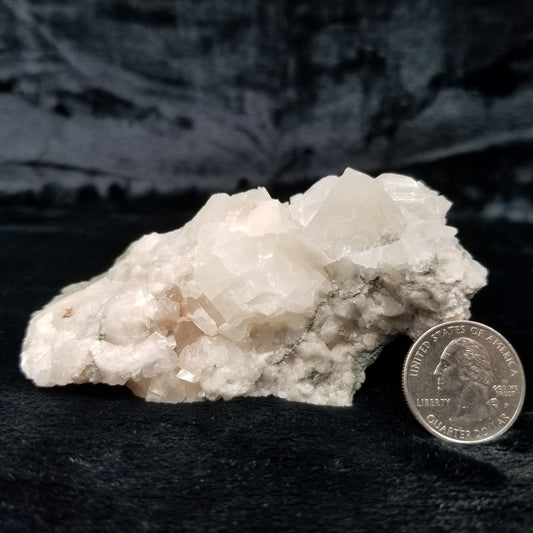 #11157 Clear and white Calcite on matrix