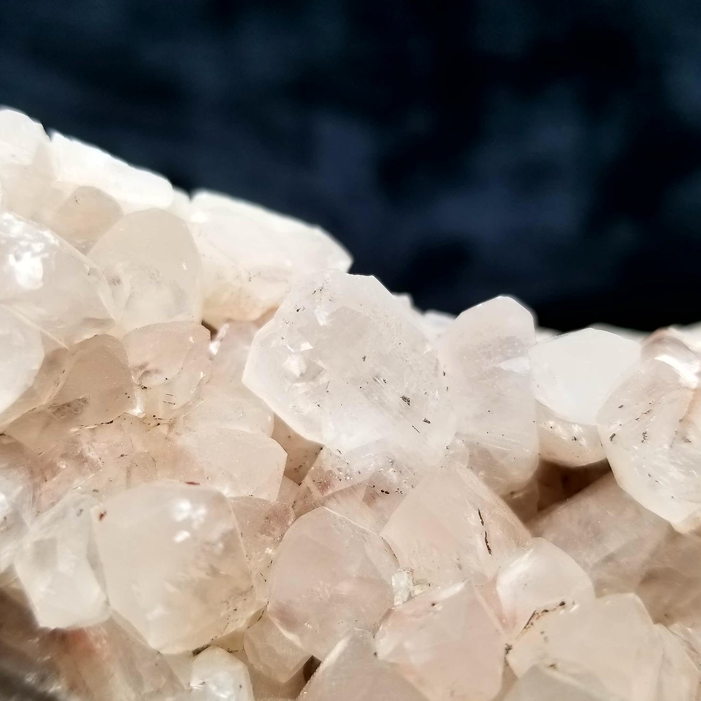 #11161 Hematite on clear Combined form Calcite cluster with Hematite phantom inclusions