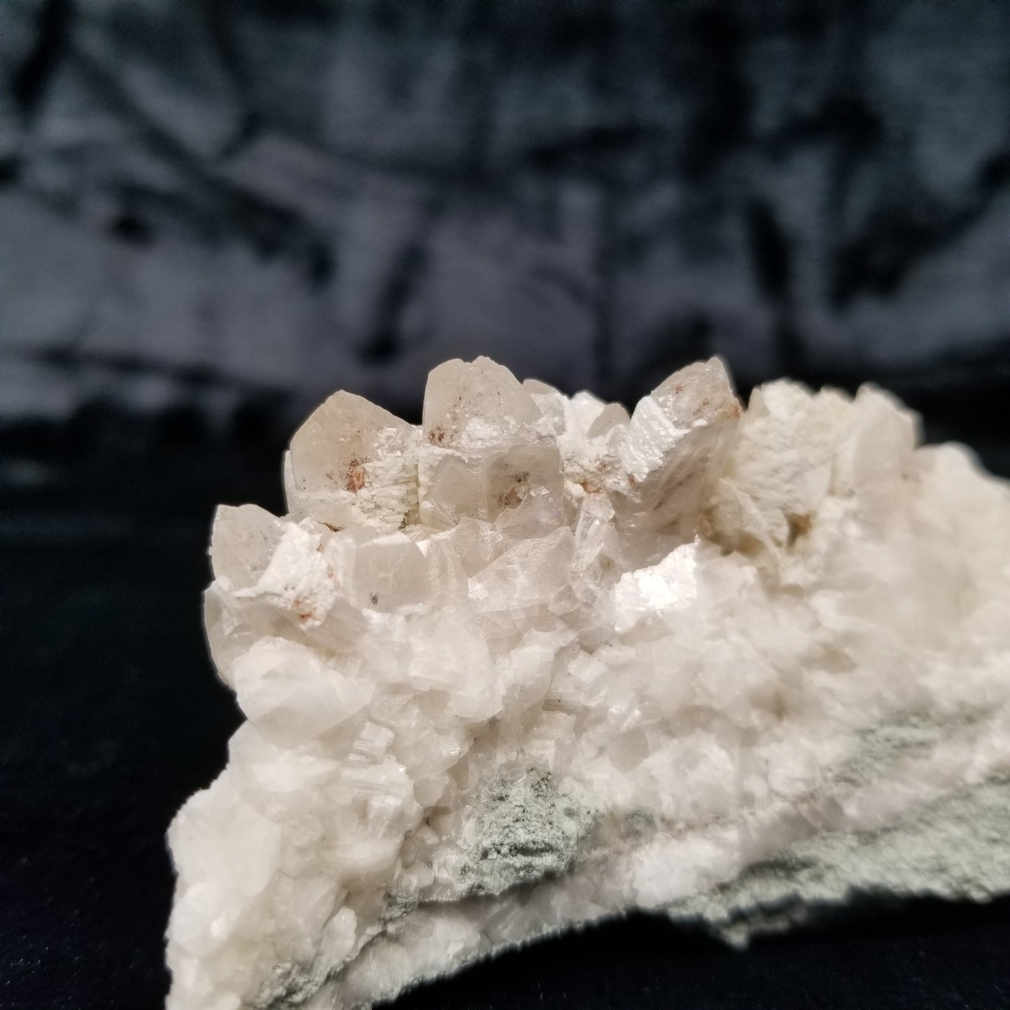 #11185 White Dolomite coating and Chalcopyrite on clear Combined form Calcite Chalcopyrite phantom inclusions