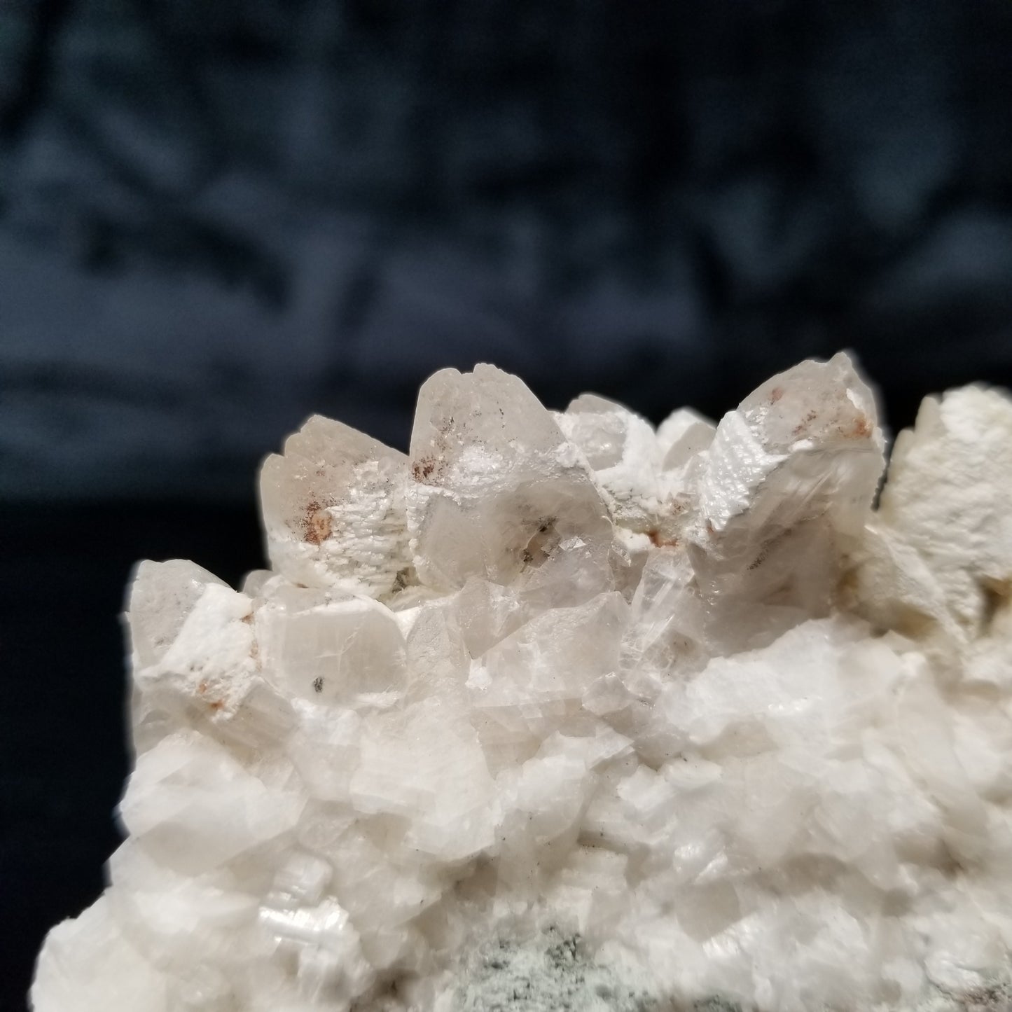 #11185 White Dolomite coating and Chalcopyrite on clear Combined form Calcite Chalcopyrite phantom inclusions