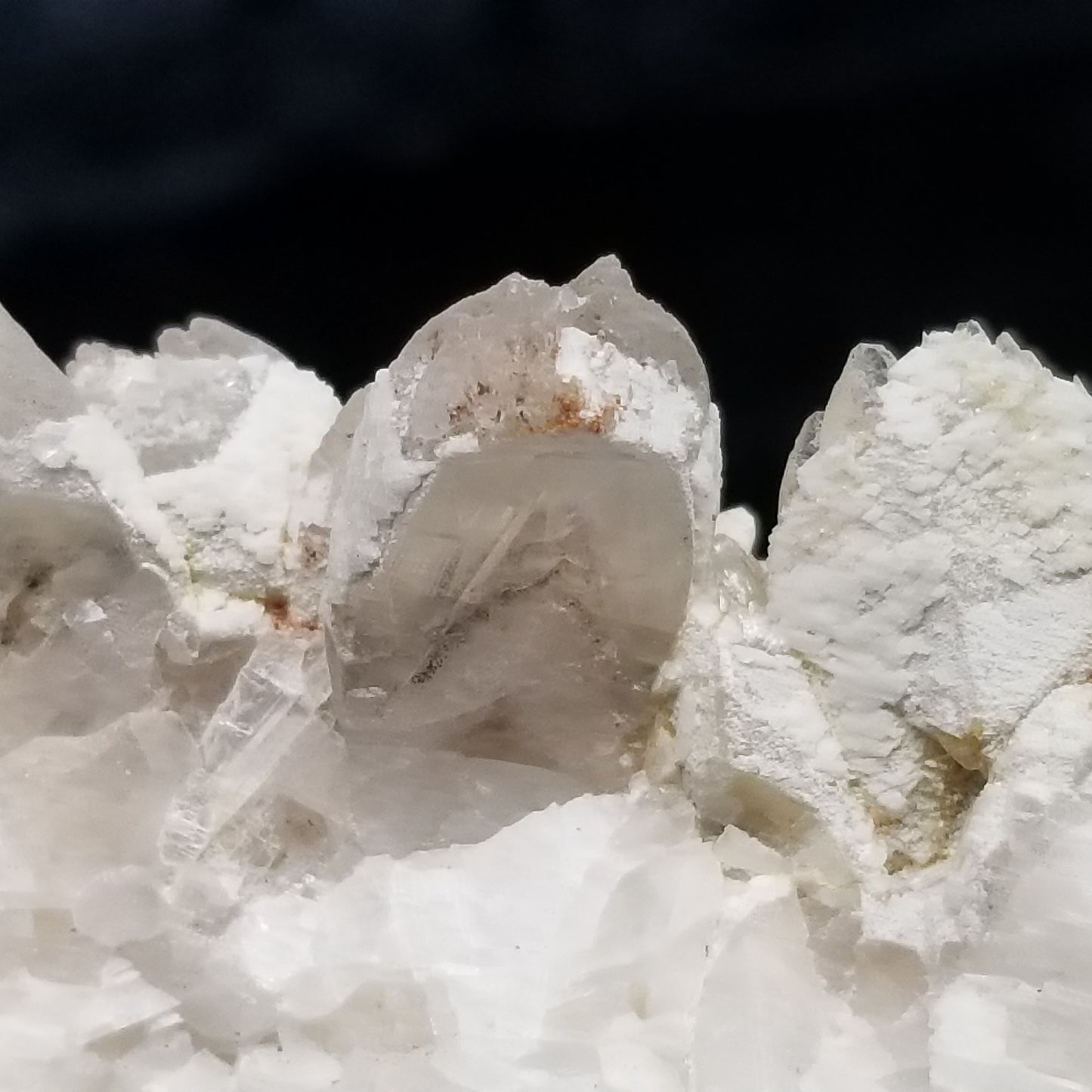 #11185 White Dolomite coating and Chalcopyrite on clear Combined form Calcite Chalcopyrite phantom inclusions