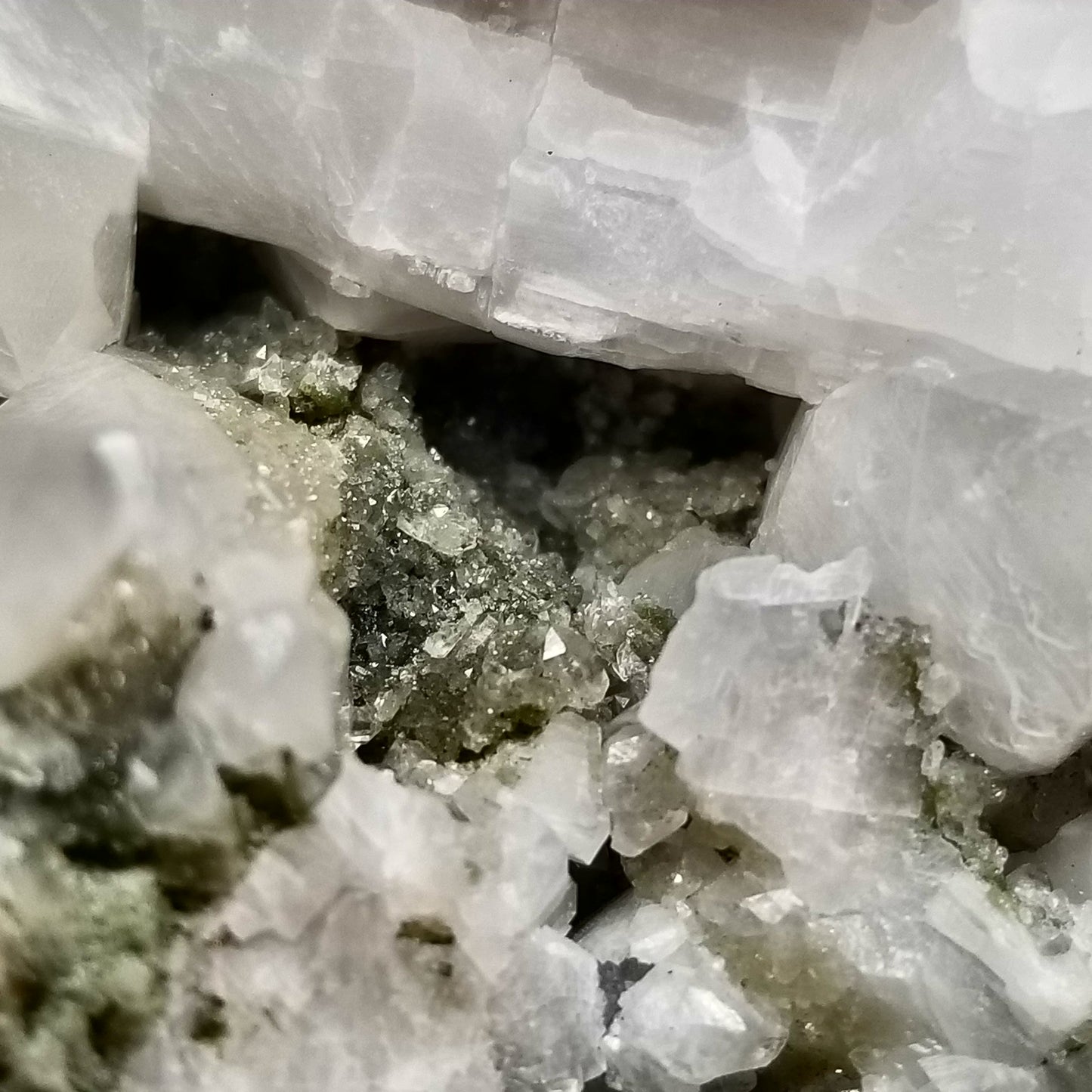 #11195 White and clear Dogtooth Spar Calcite formation with small Spirit Quartz formation on matrix