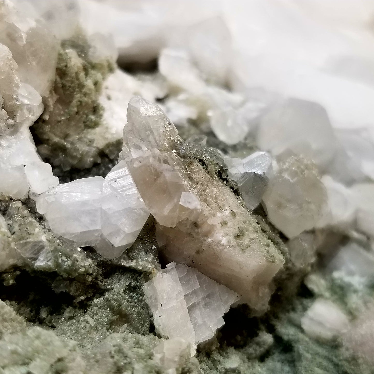#11195 White and clear Dogtooth Spar Calcite formation with small Spirit Quartz formation on matrix