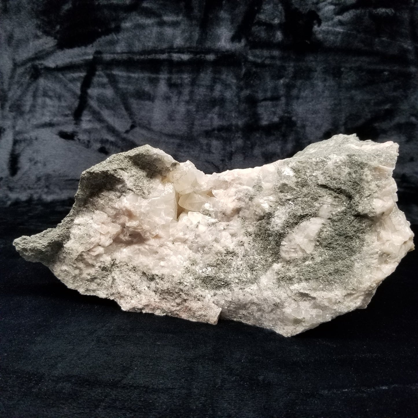 #11201 Chalcopyrite dust on white and clear Combined form Calcite on matrix