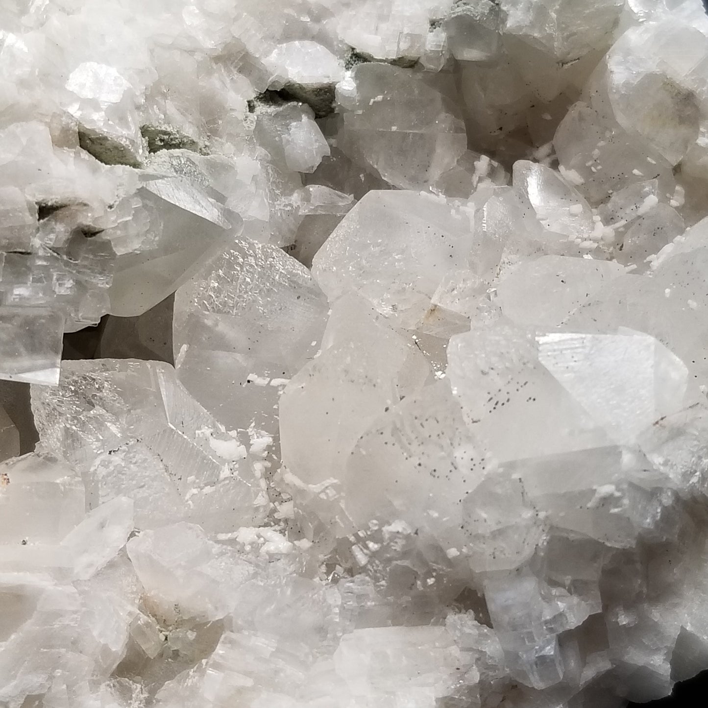 #11202 White Dolomite coating and Chalcopyrite on clear Combined form Calcite with Chalcopyrite inclusions